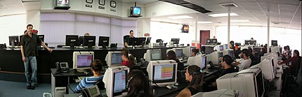 Bodog Sportsbook wagering center, oddsmakers and sportsbook managers are located in the front of the room full of betting clerks ready to accept your wagers