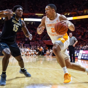 Tennessee Volunteers forward Grant Williams (2) drives around Vanderbilt Commodores forward Clevon Brown (15) during a college basketball game between the Tennessee Volunteers and Vanderbilt Commodores.