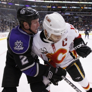 Flames Jarome Iginla (12) and Kings Matt Greene (2)