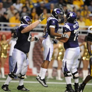 Northwestern players celebrate during the 2008 Alamo Bowl.