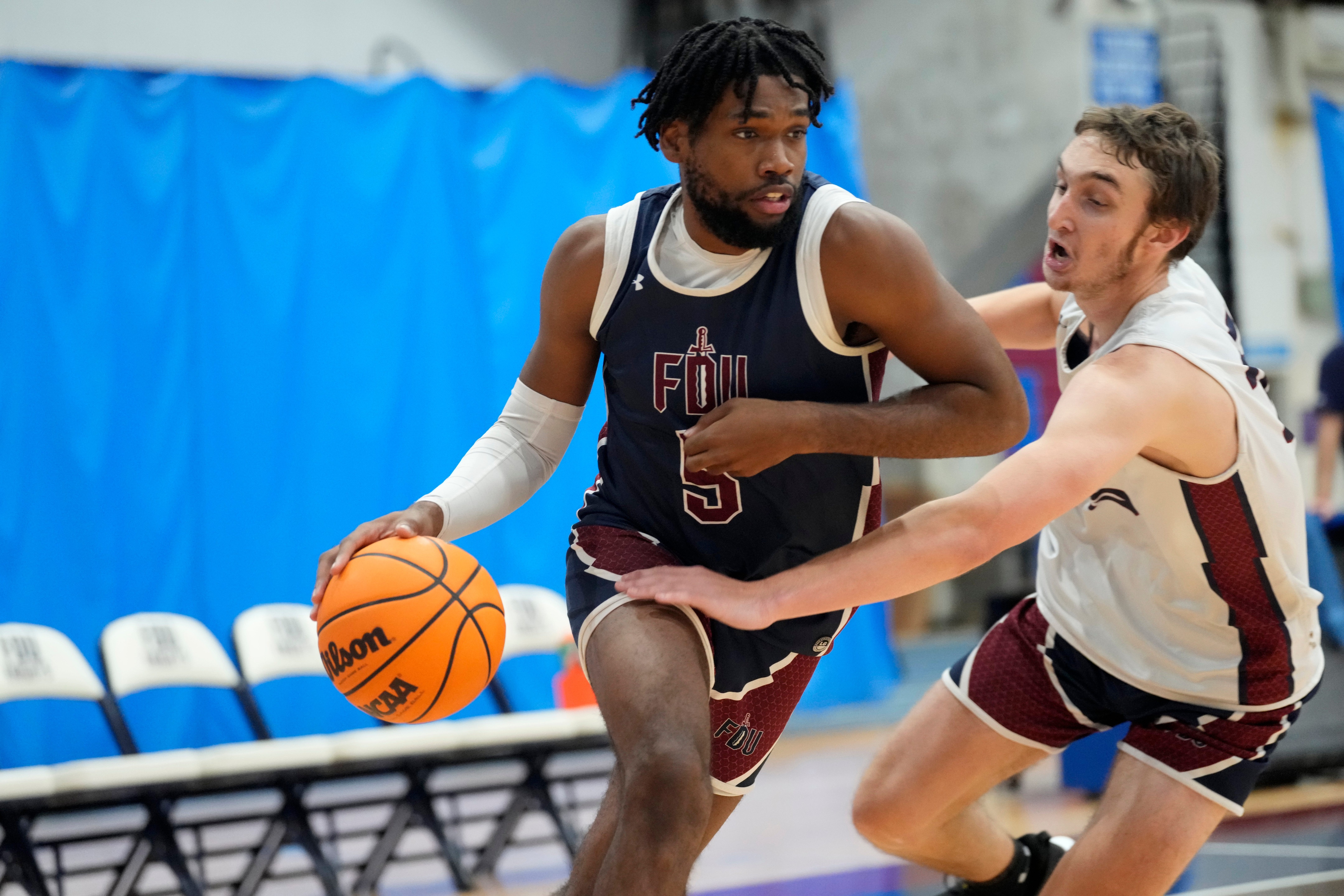 college basketball picks Ansley Almonor Fairleigh Dickinson Knights predictions best bet odds