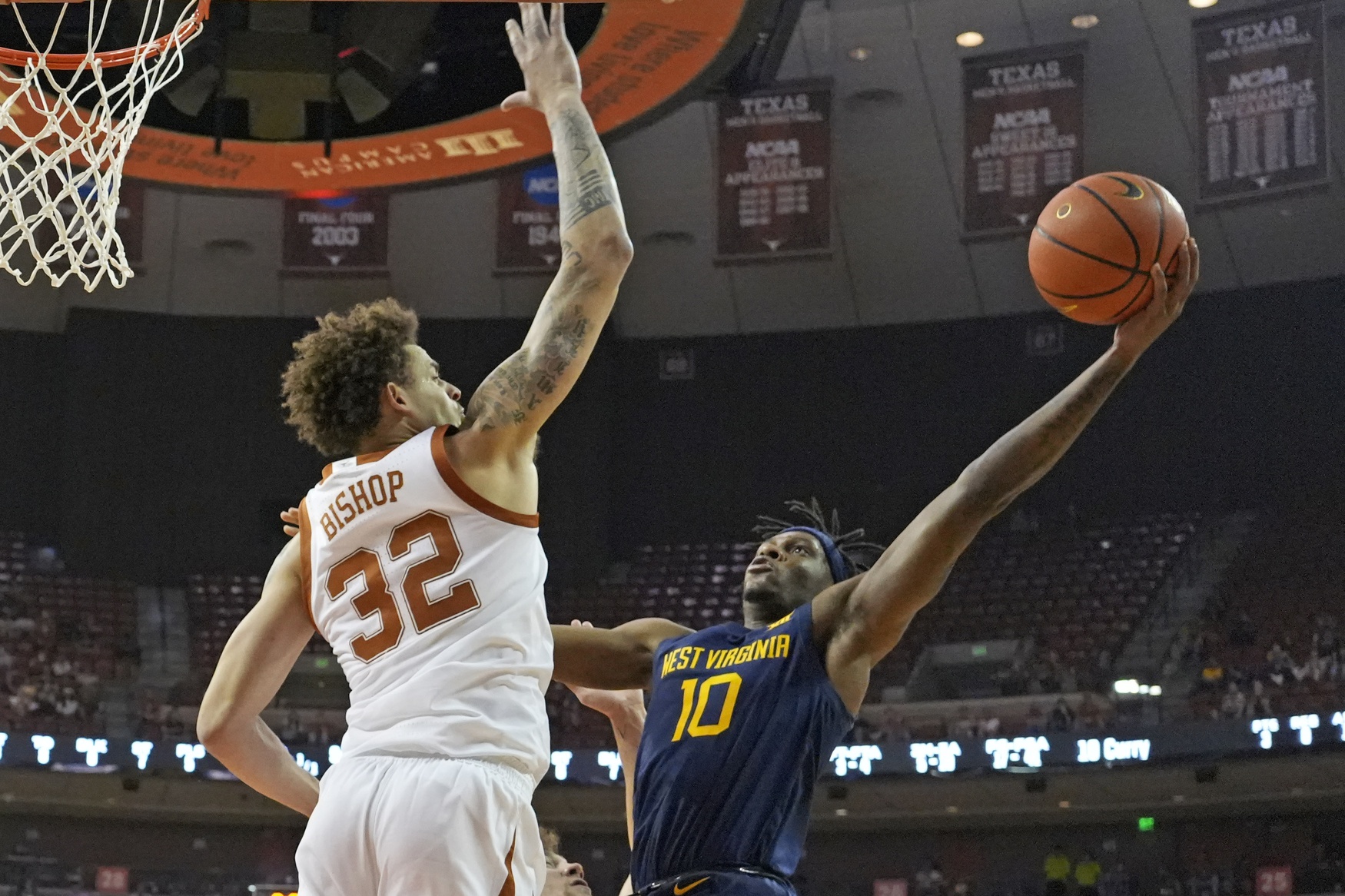 college basketball picks Christian Bishop Texas Longhorns predictions best bet odds