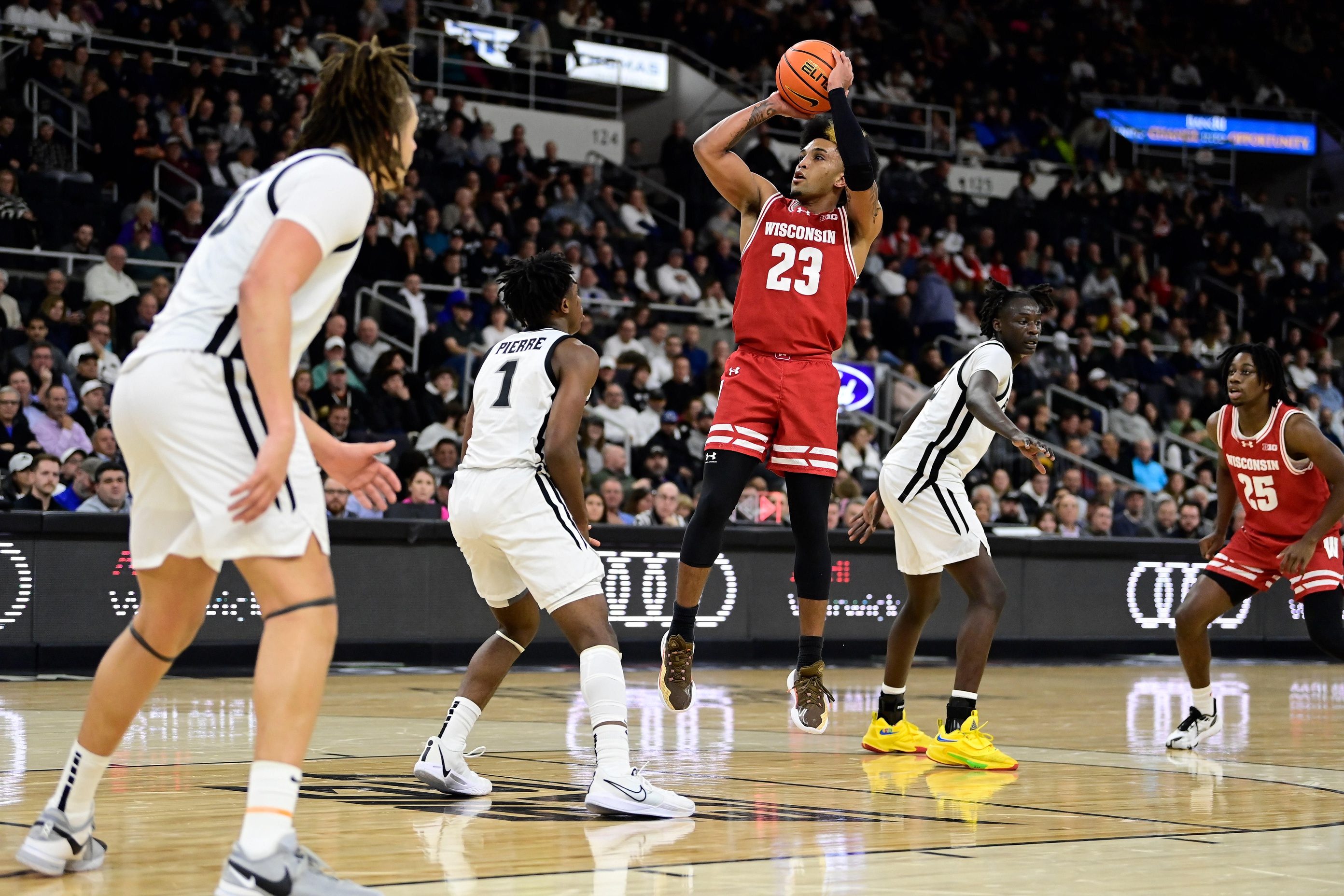 college basketball picks Chucky Hepburn Wisconsin Badgers predictions best bet odds