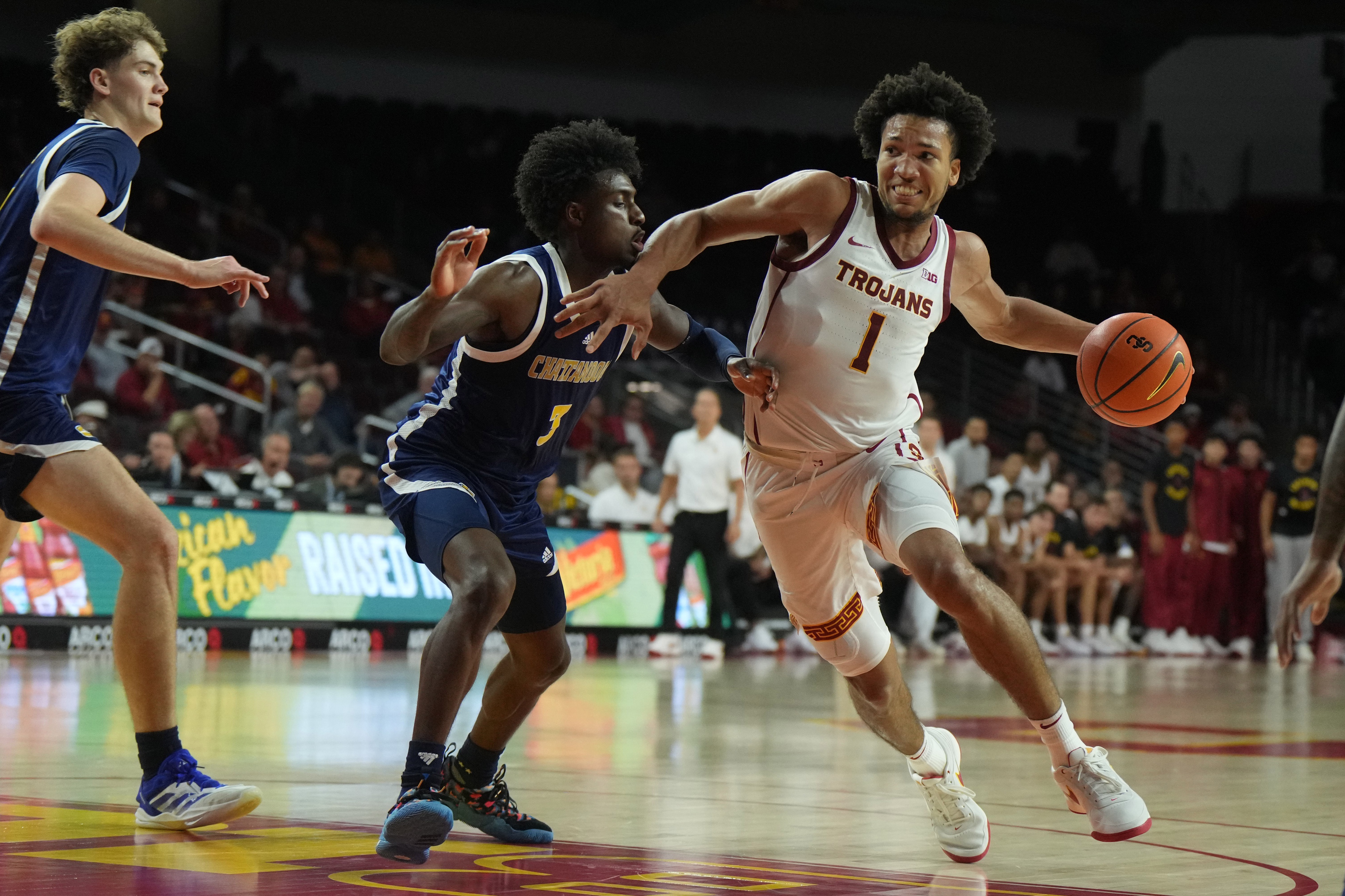 college basketball picks Desmond Claude USC Trojans predictions best bet odds