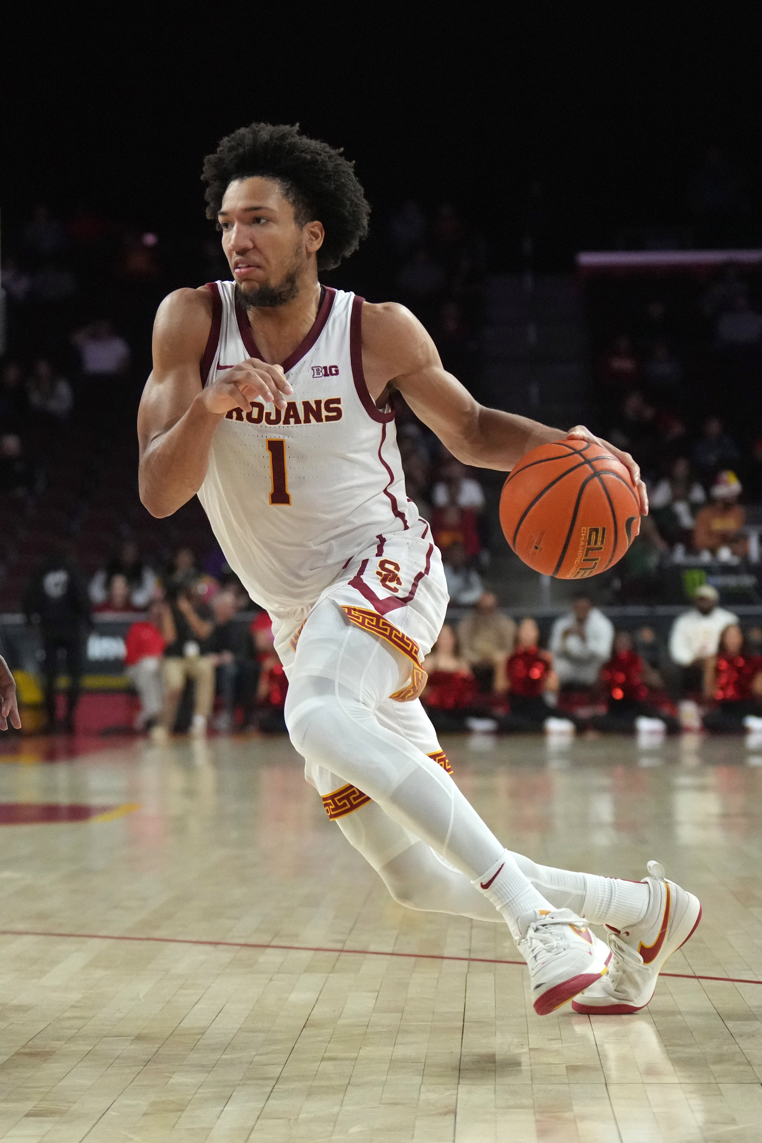 college basketball picks Desmond Claude USC Trojans predictions best bet odds