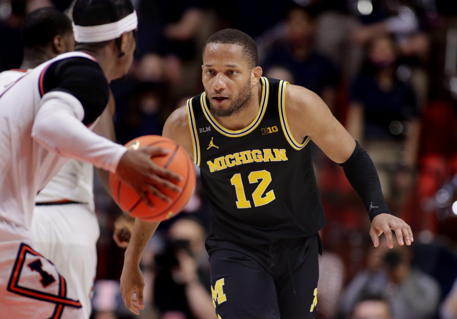 college basketball picks DeVante' Jones Michigan Wolverines predictions best bet odds