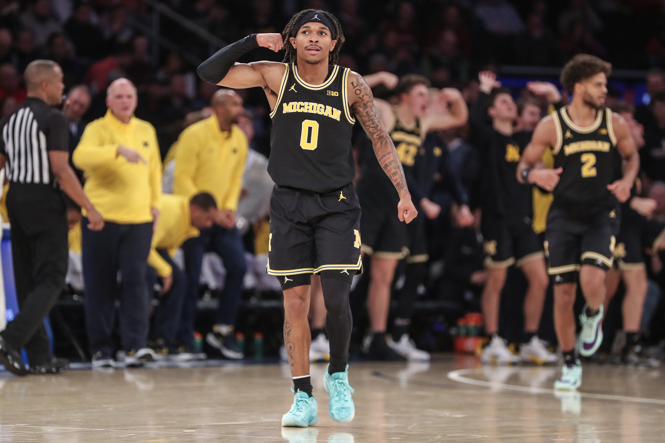 college basketball picks Dug McDaniel Michigan Wolverines predictions best bet odds