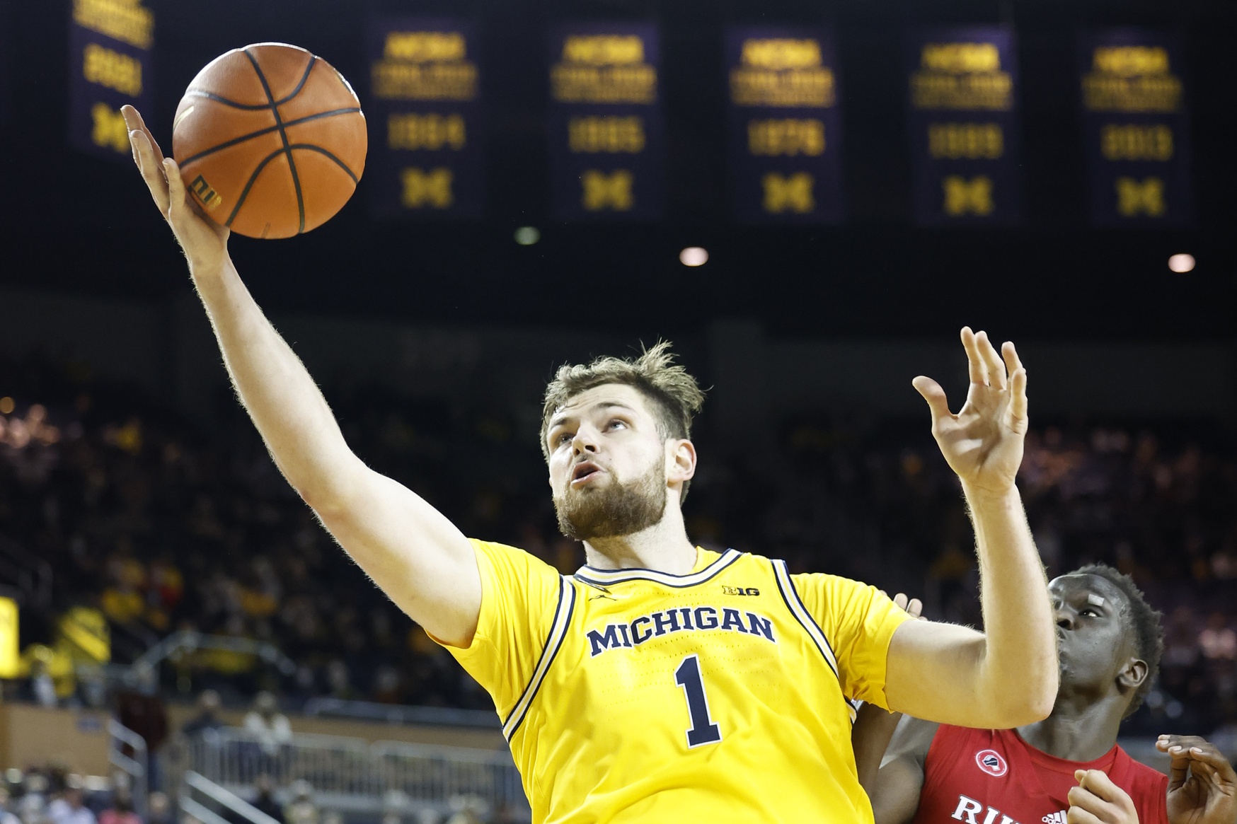 college basketball picks Hunter Dickinson Michigan Wolverines predictions best bet odds