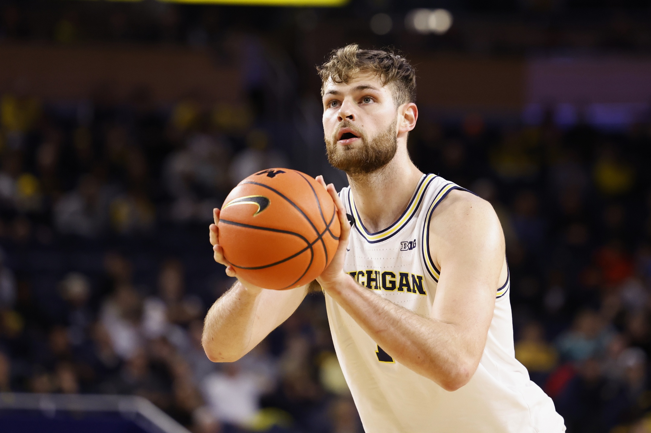 college basketball picks Hunter Dickinson Michigan Wolverines predictions best bet odds