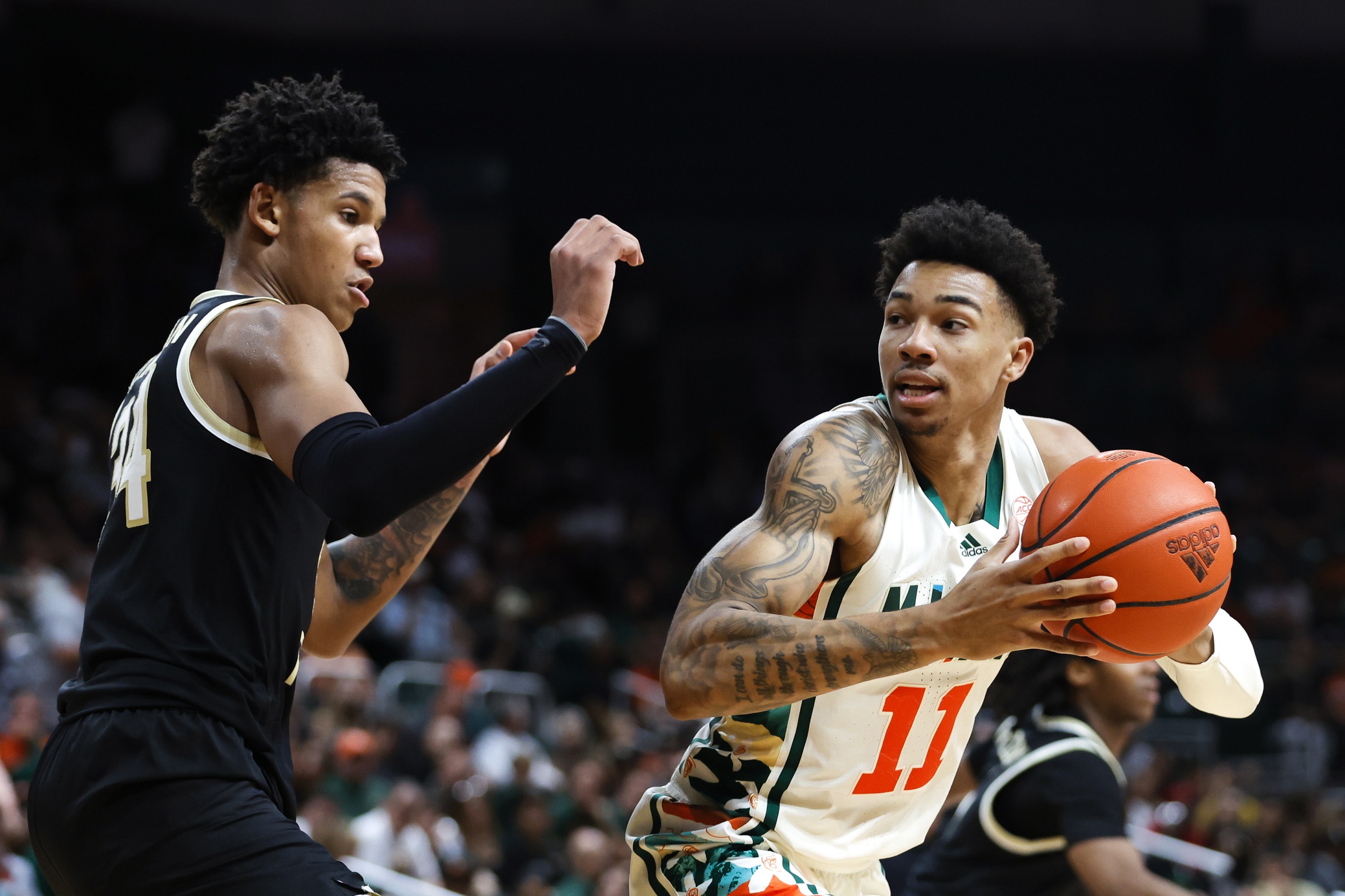 college basketball picks Jordan Miller Miami Hurricanes predictions best bet odds