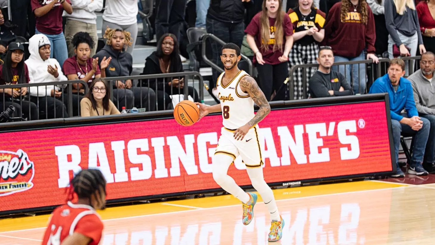 college basketball picks Justin Moore Loyola Ramblers predictions best bet odds