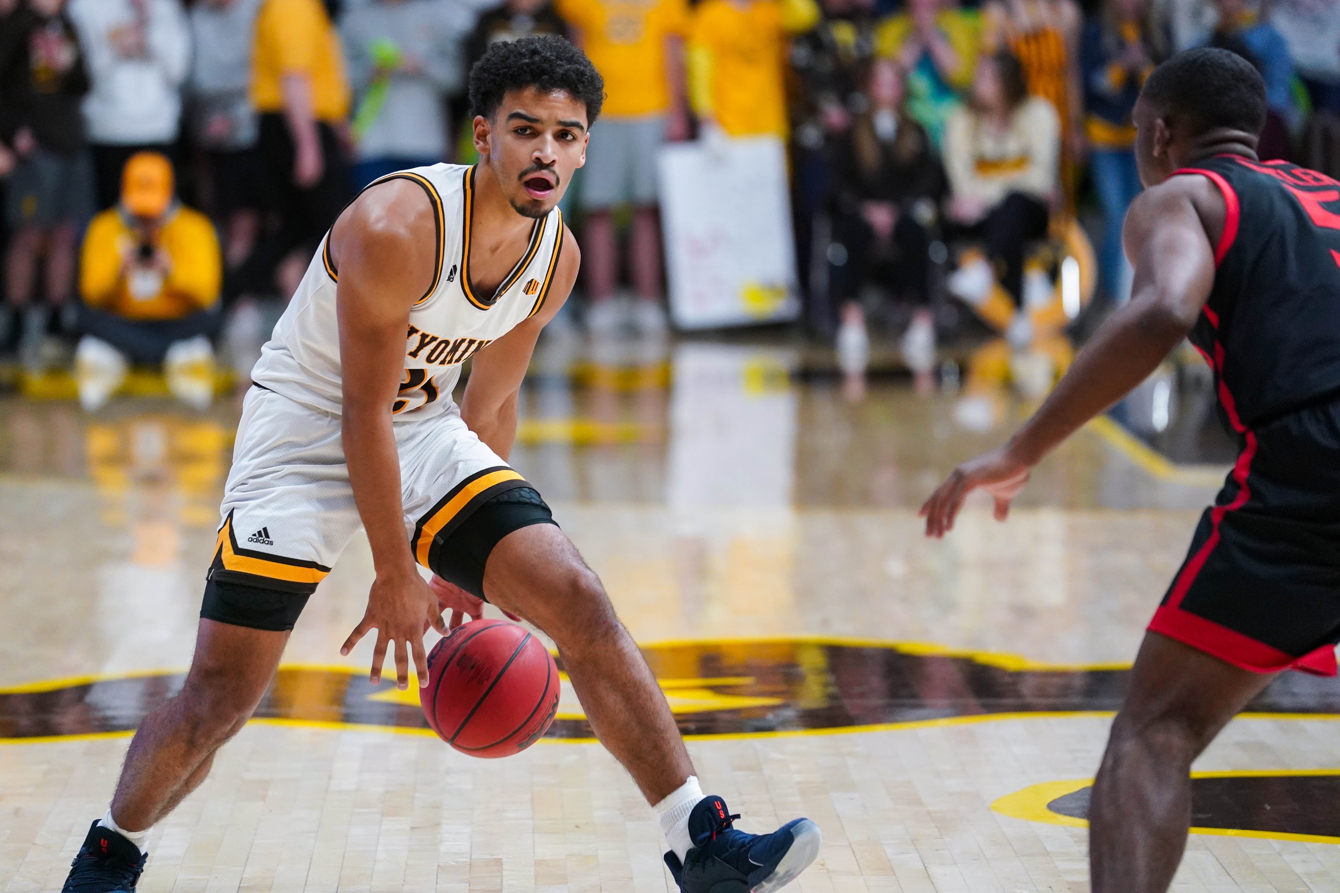 college basketball picks Noah Reynolds Wyoming Cowboys predictions best bet odds