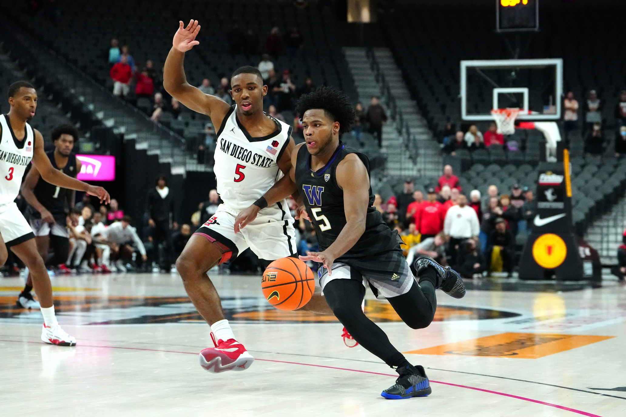 college basketball picks Sahvir Wheeler Washington Huskies predictions best bet odds