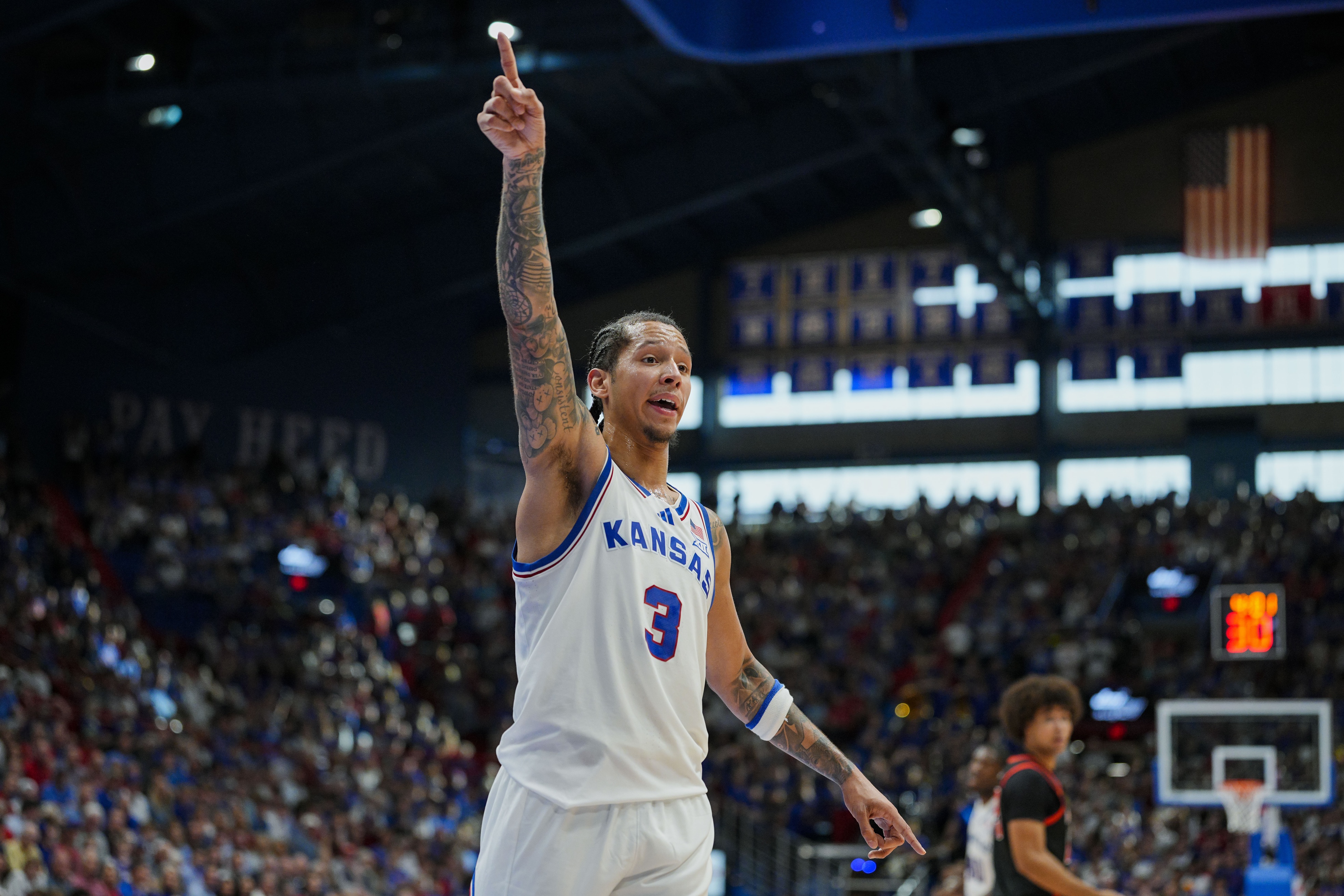 college basketball picks Tre White Kansas Jayhawks predictions best bet odds