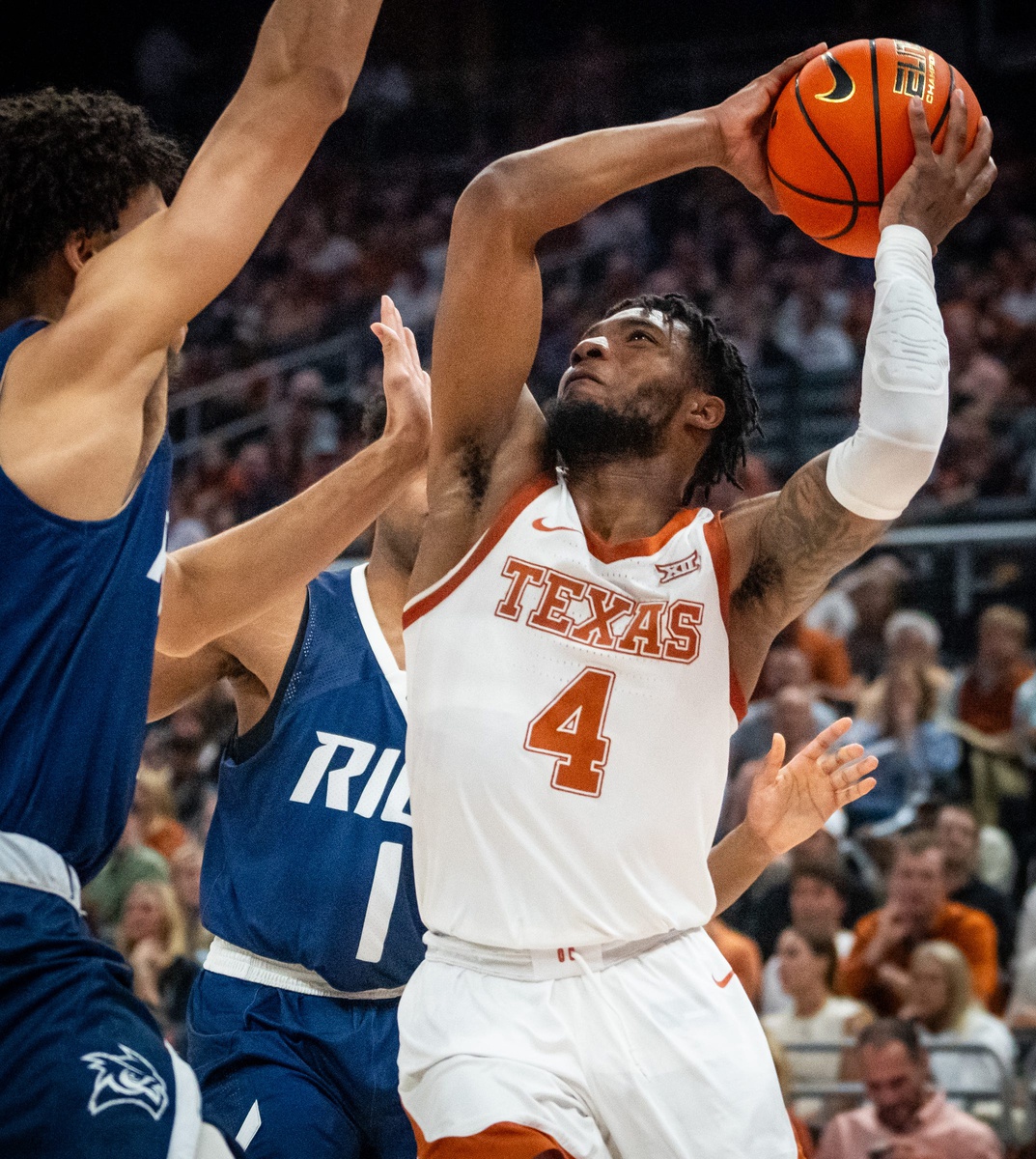 college basketball picks Tyrese Hunter Texas Longhorns predictions best bet odds