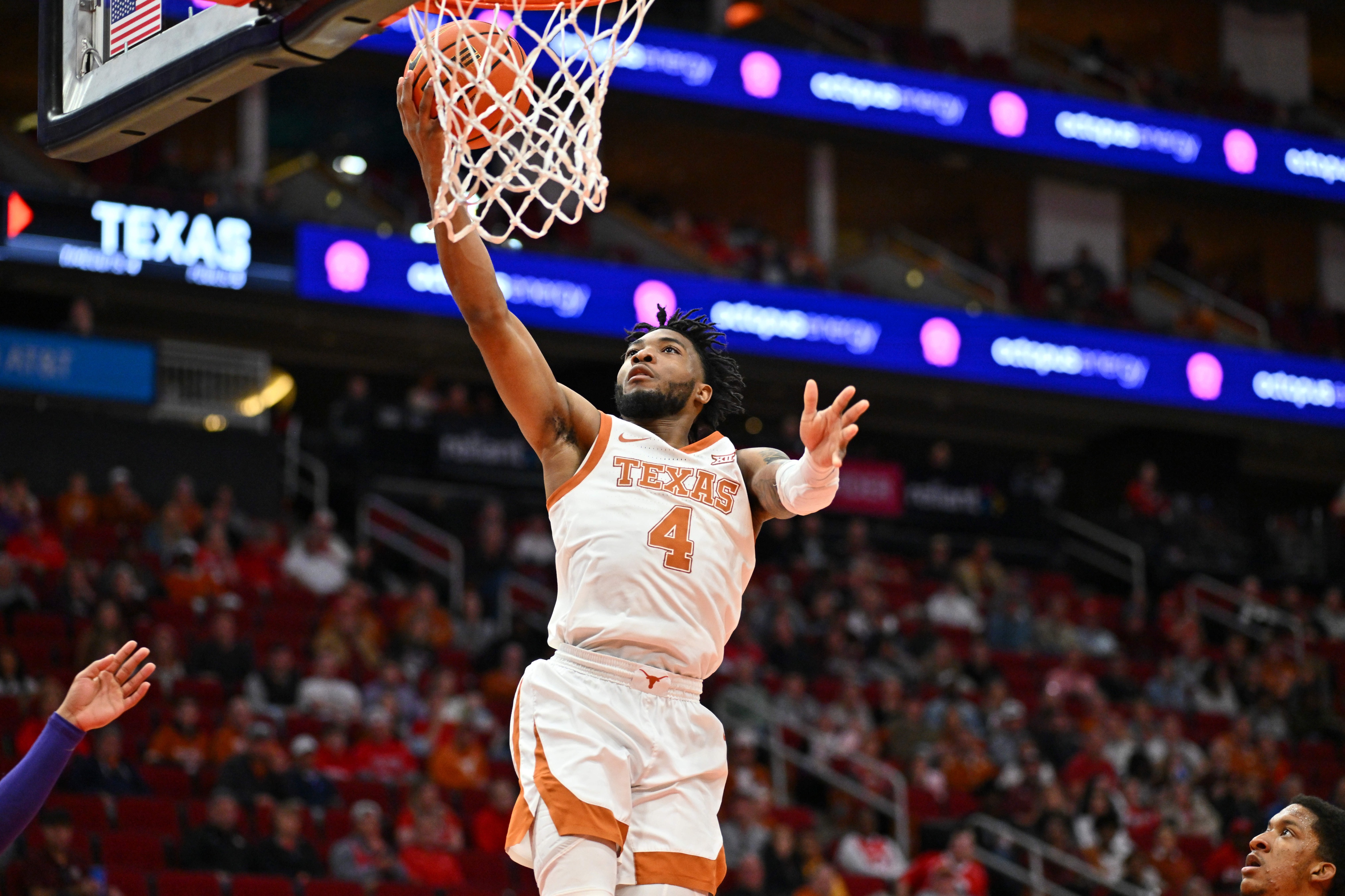 college basketball picks Tyrese Hunter Texas Longhorns predictions best bet odds