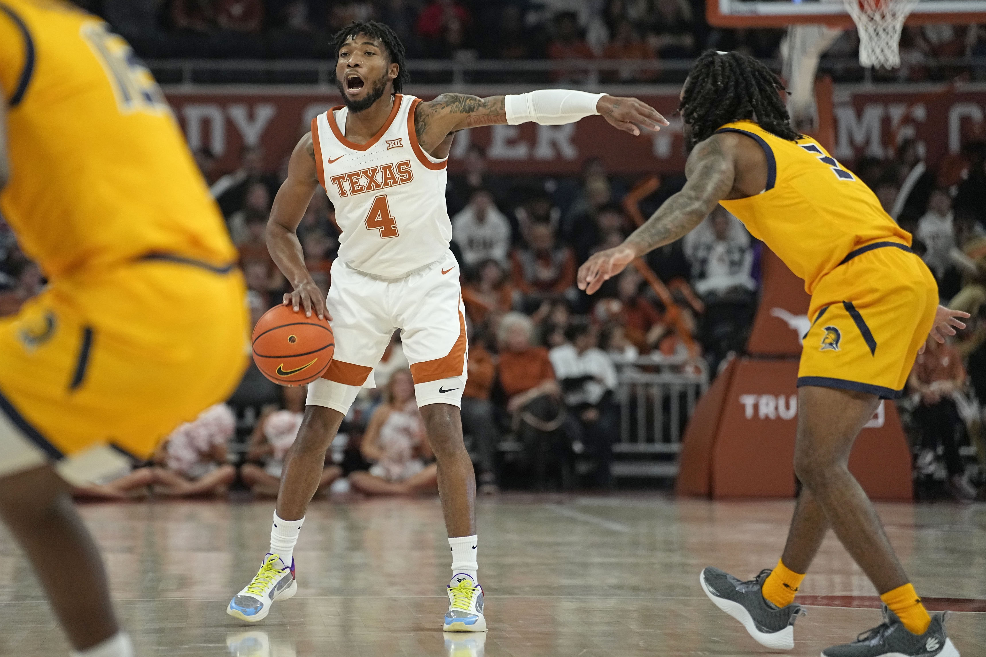 college basketball picks Tyrese Hunter Texas Longhorns predictions best bet odds