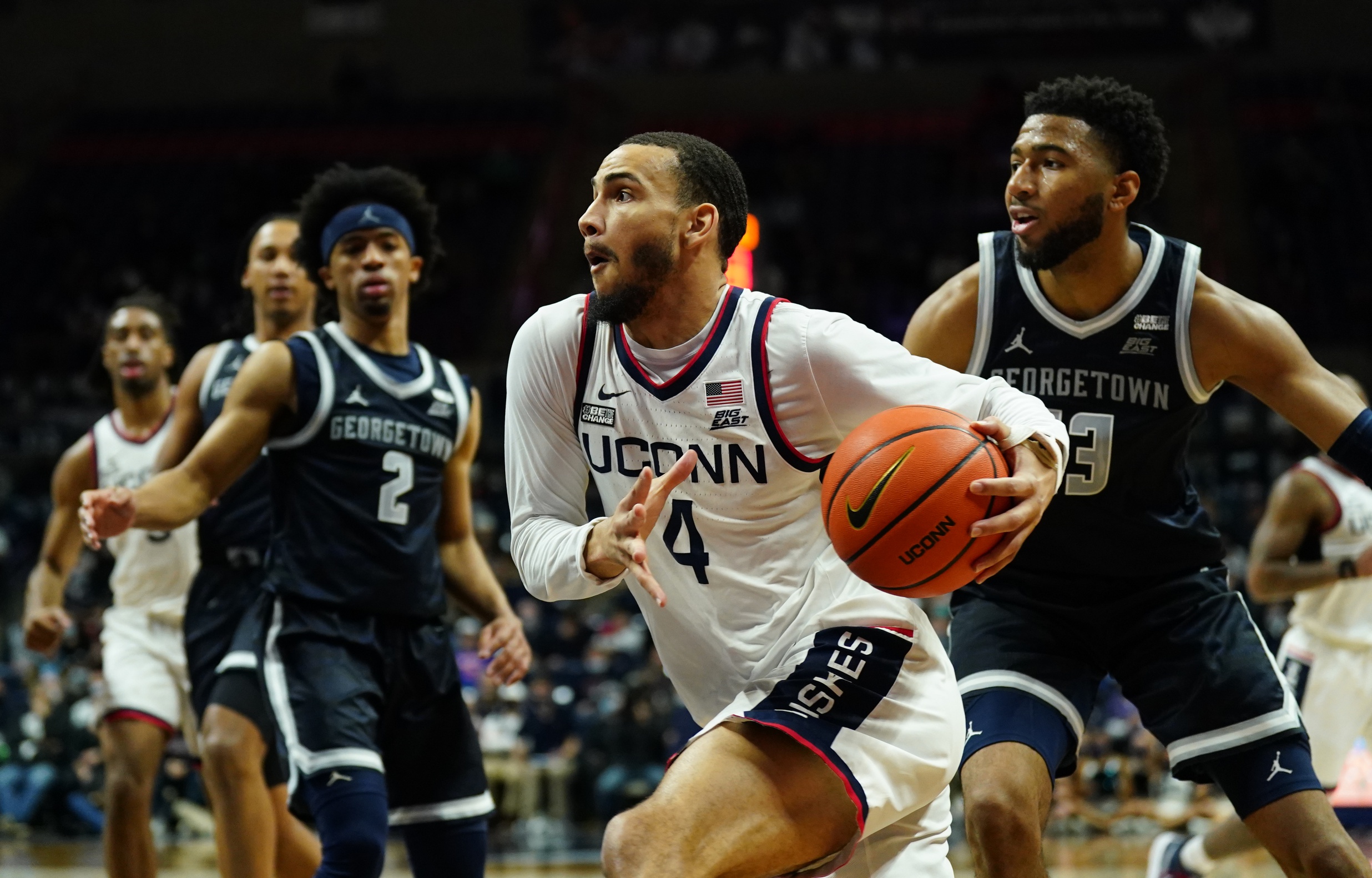college basketball picks Tyrese Martin Connecticut Huskies predictions best bet odds