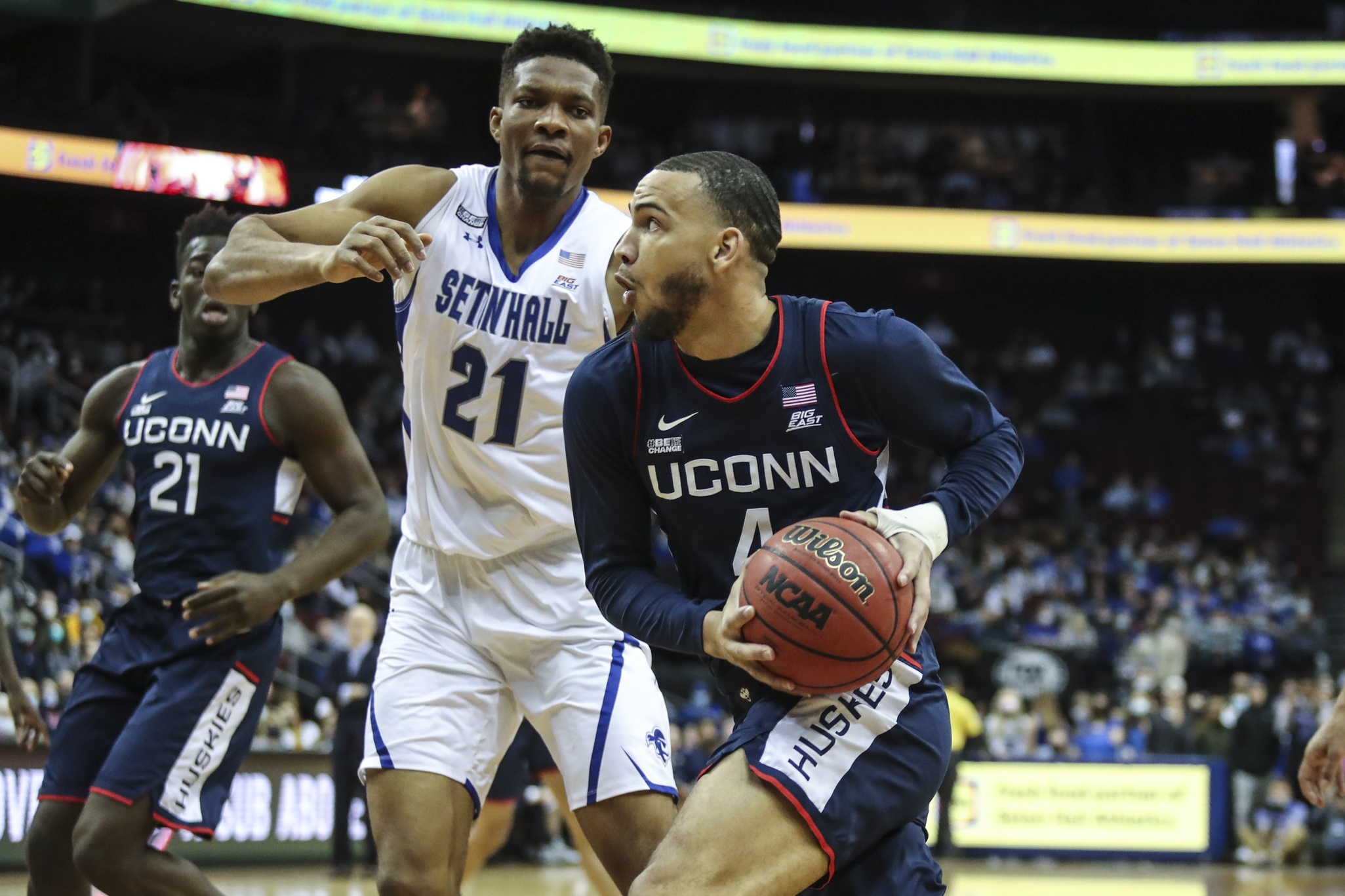 college basketball picks Tyrese Martin Connecticut Huskies predictions best bet odds