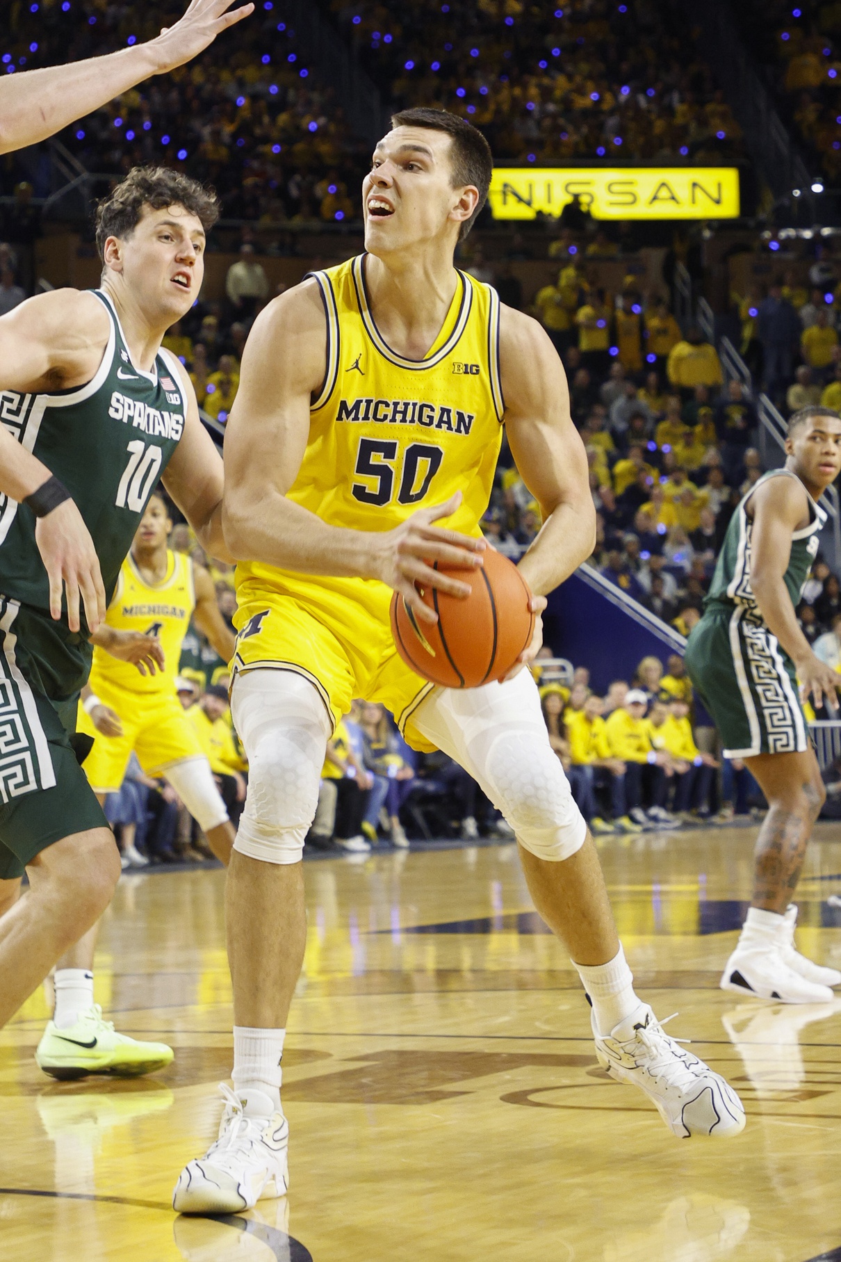 college basketball picks Vladislav Goldin Michigan Wolverines predictions best bet odds