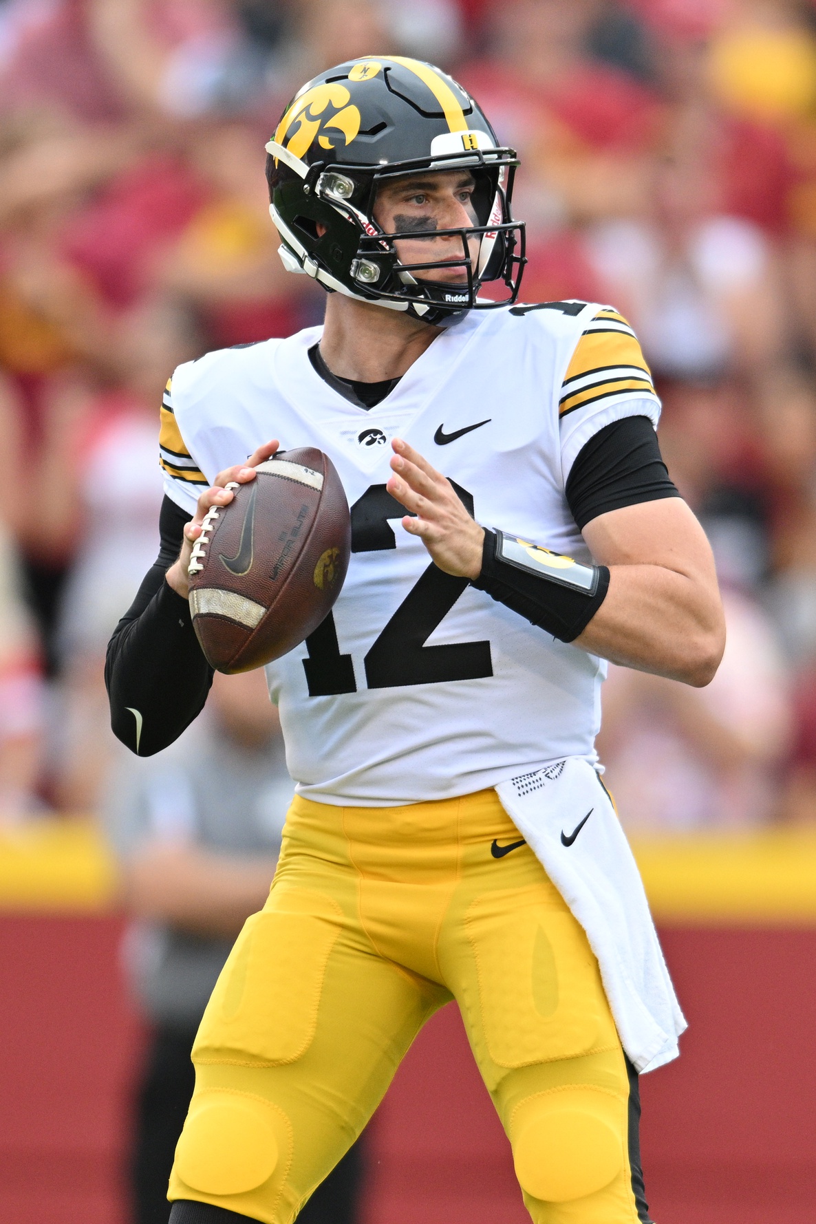 college football picks Cade McNamara Iowa Hawkeyes predictions best bet odds
