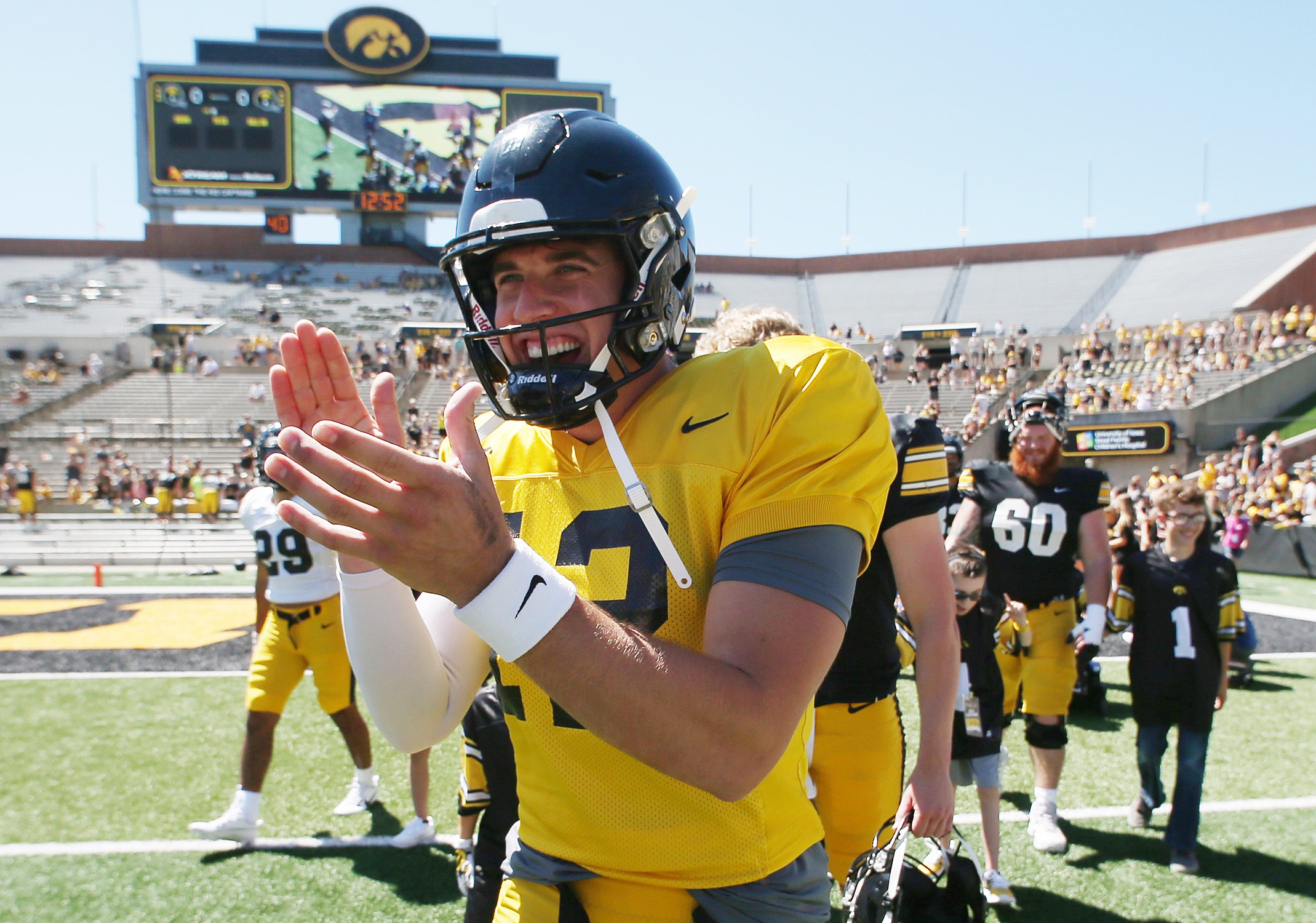 college football picks Cade McNamara Iowa Hawkeyes predictions best bet odds