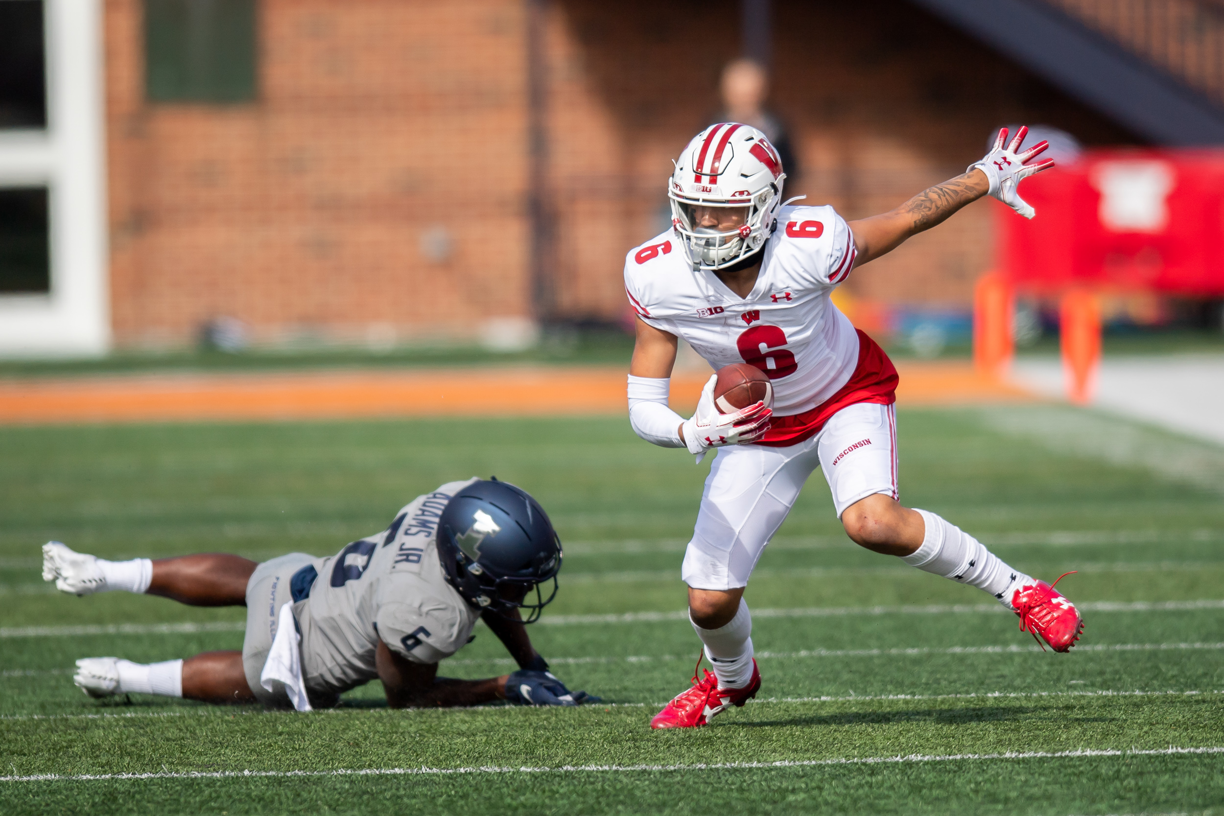 college football picks Danny Davis wisconsin badgers predictions best bet odds