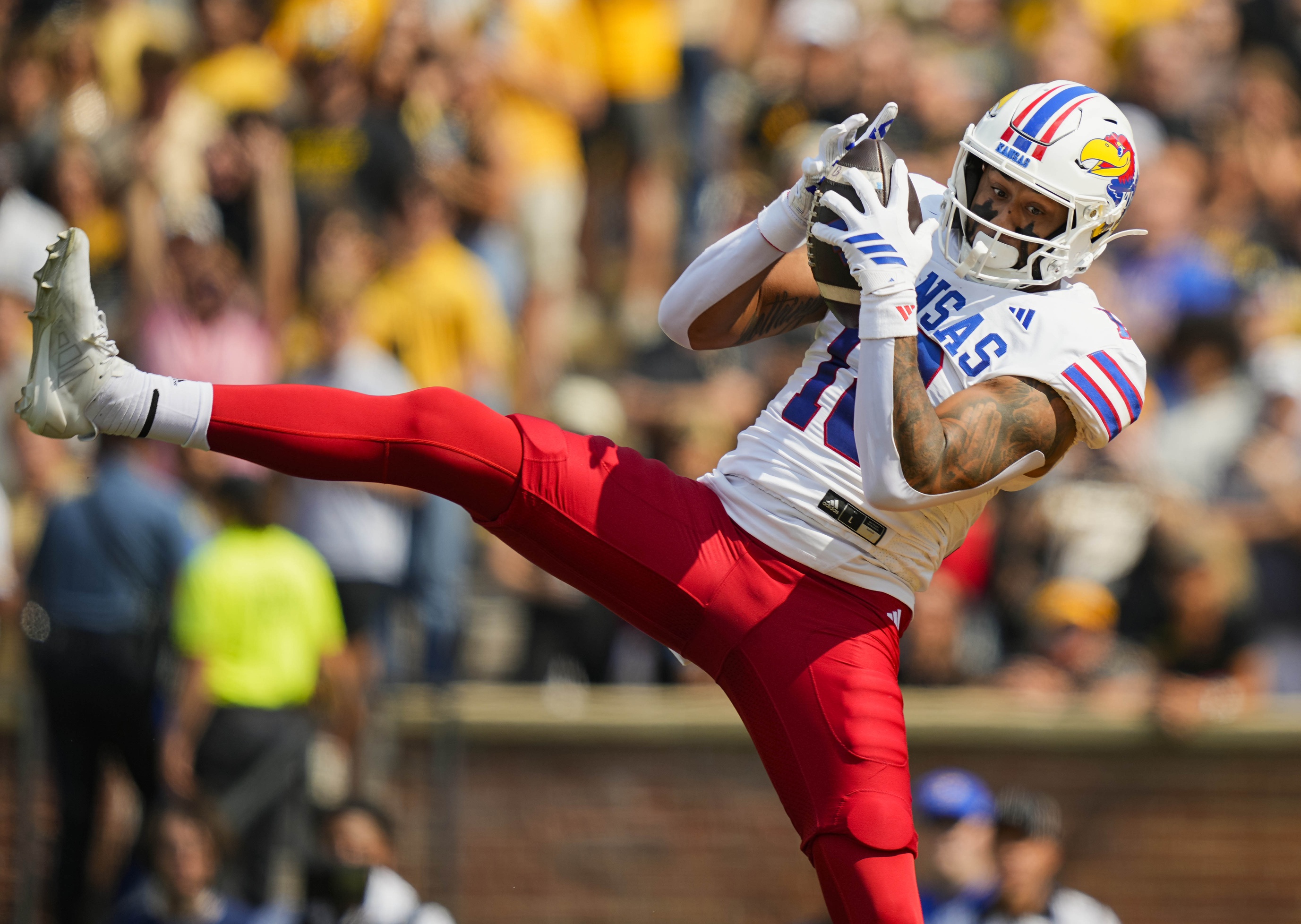 college football picks DeShawn Hanika Kansas Jayhawks predictions best bet odds