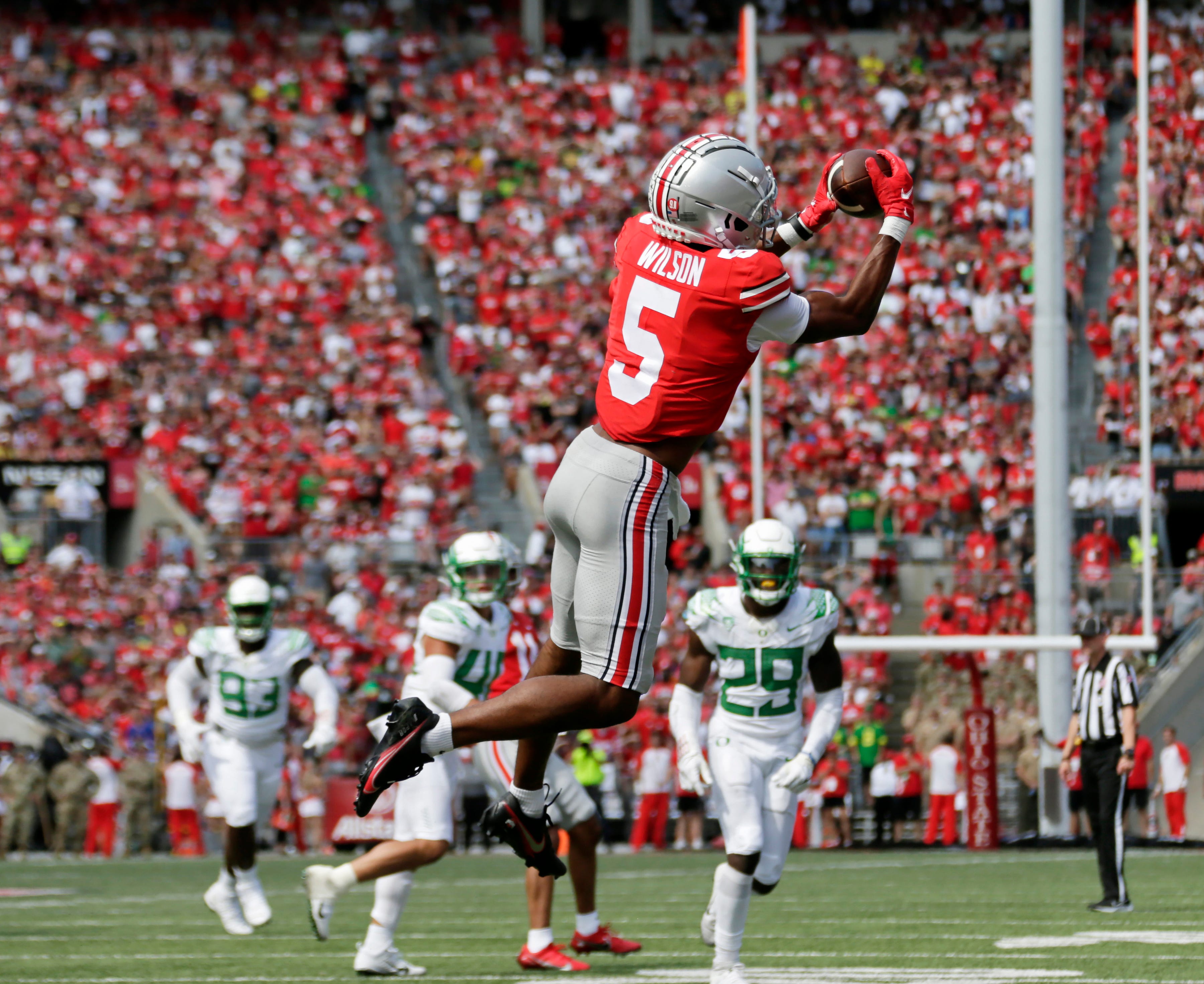 college football picks Garrett Wilson ohio state buckeyes predictions best bet odds