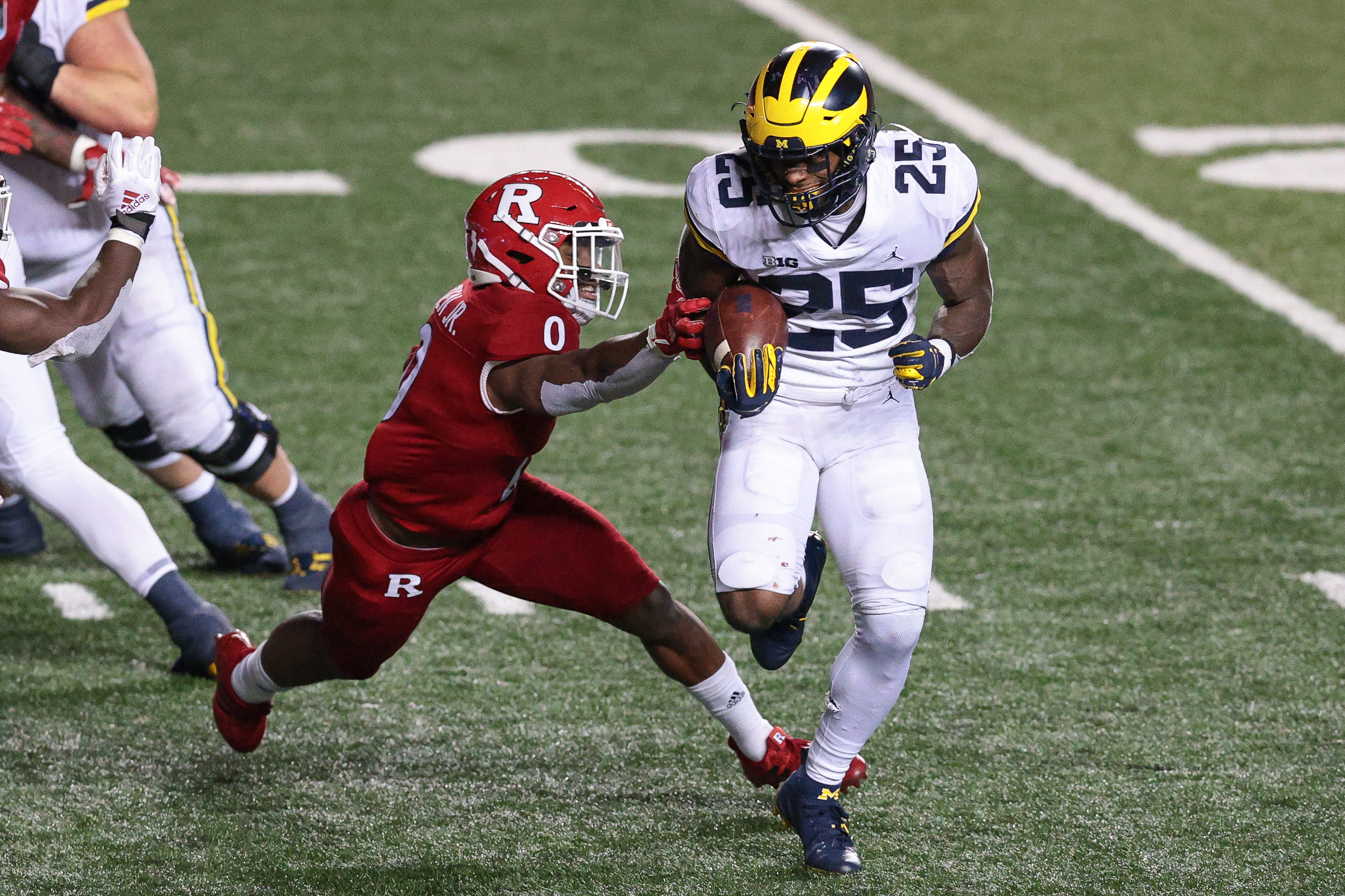 college football picks Hassan Haskins michigan wolverines predictions best bet odds