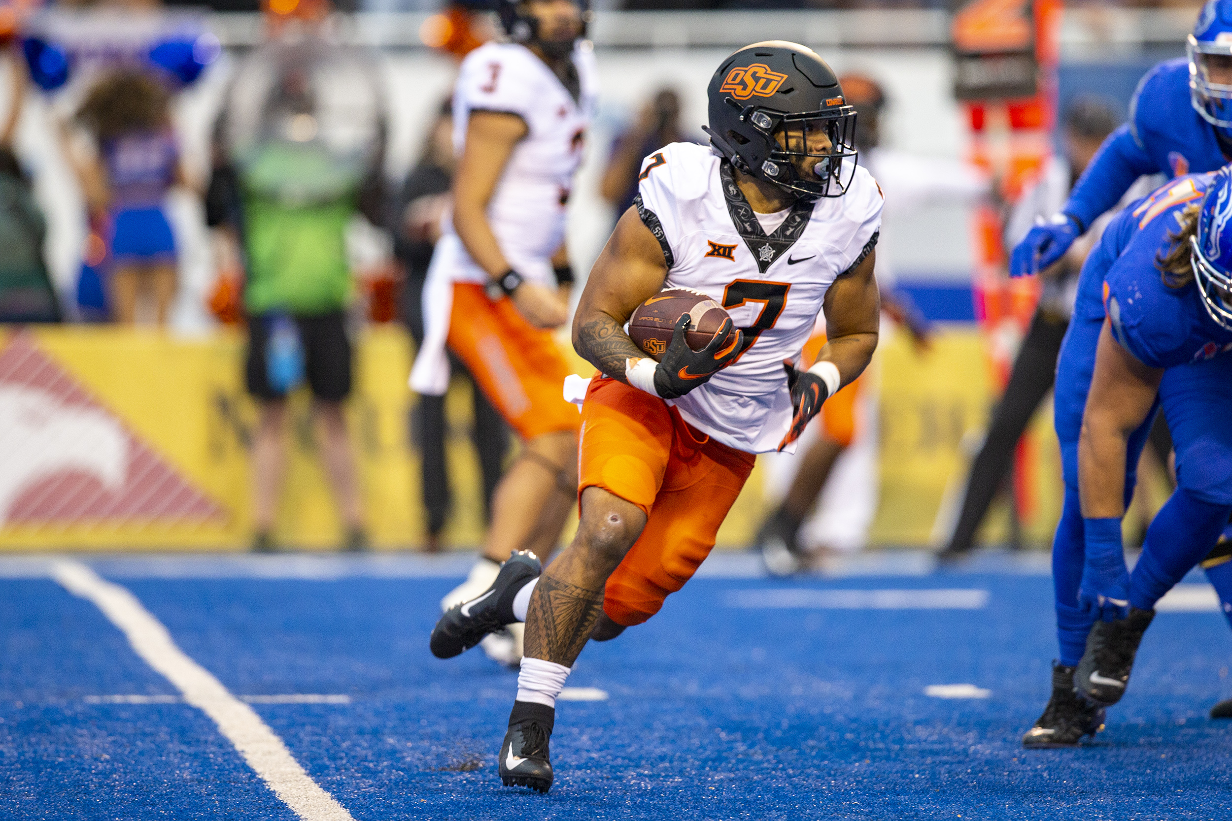 college football picks Jaylen Warren oklahoma state cowboys predictions best bet odds
