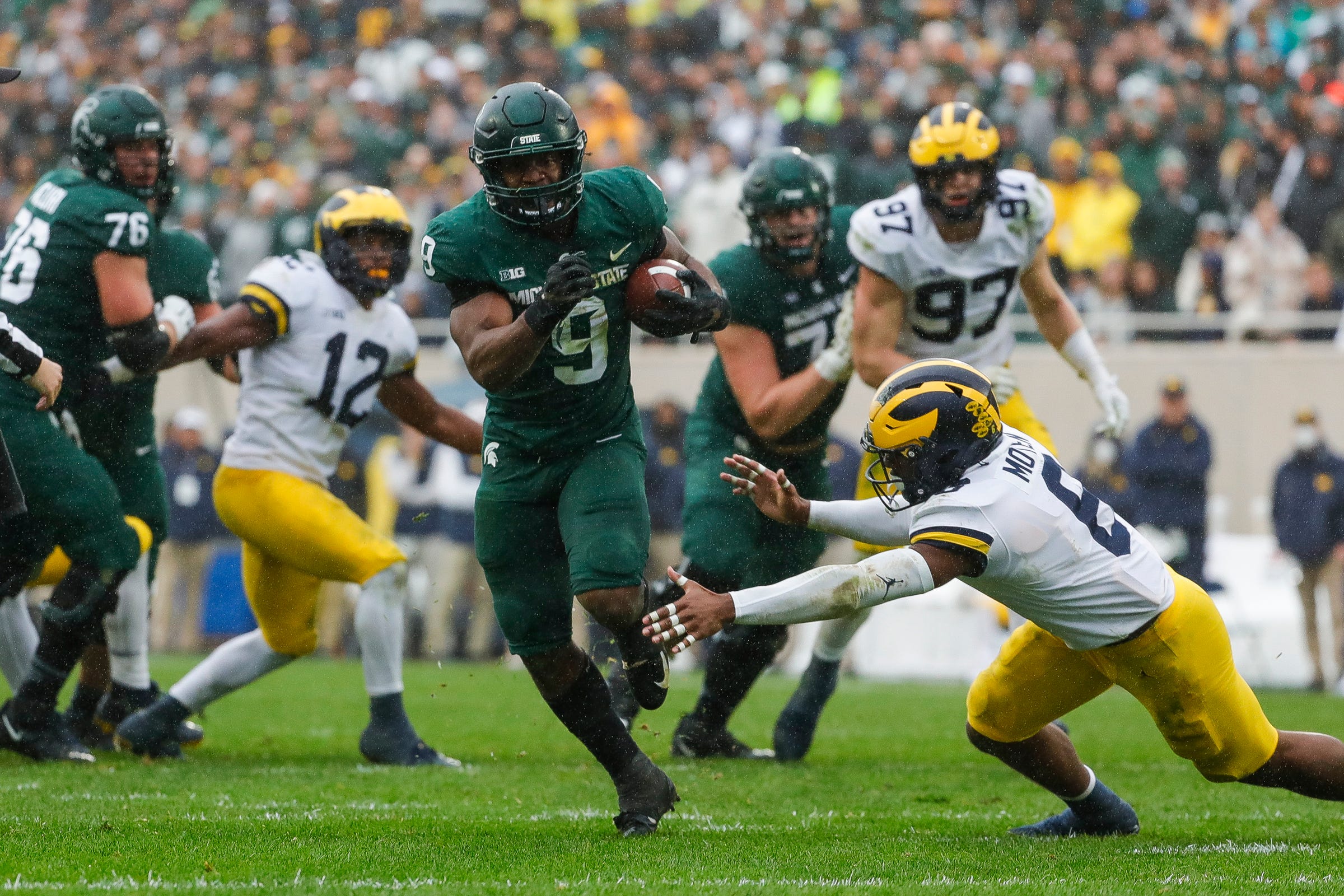 college football picks Kenneth Walker michigan state spartans predictions best bet odds