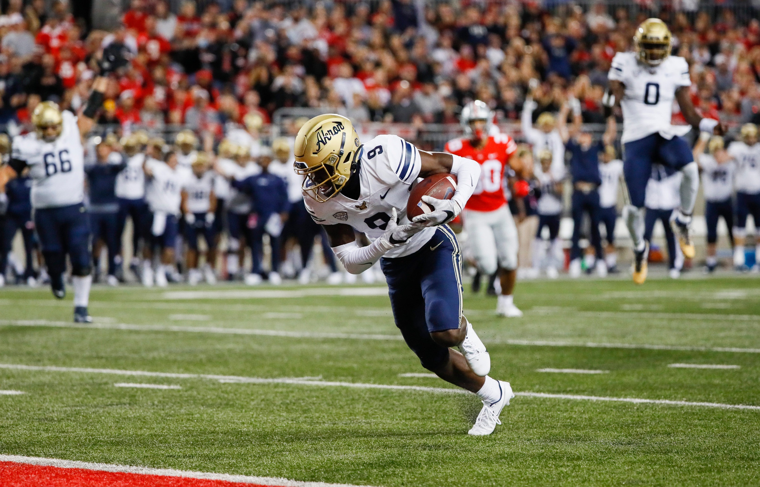 college football picks Konata Mumpfield Akron Zips predictions best bet odds