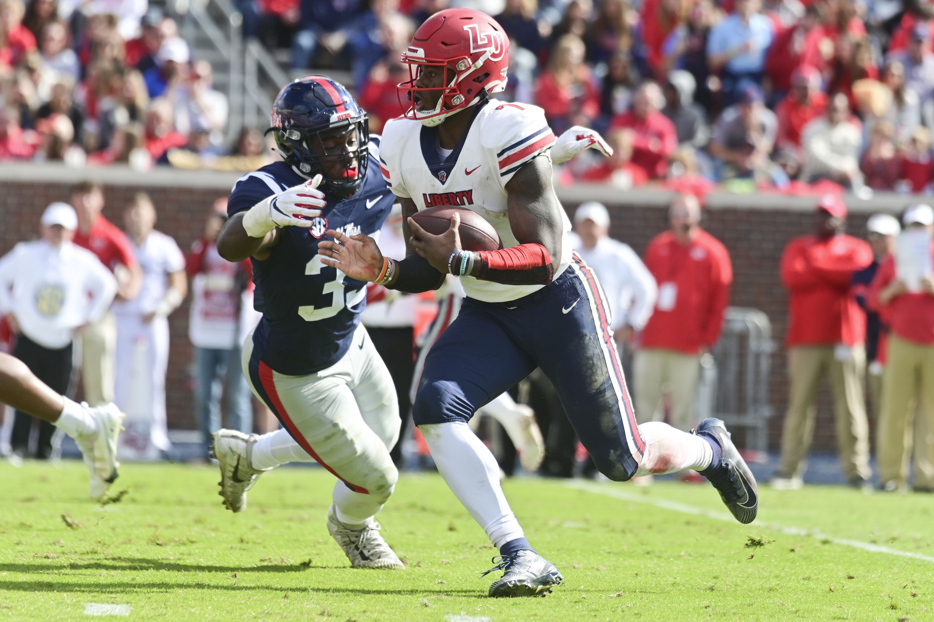college football picks Malik Willis Liberty Flames predictions best bet odds