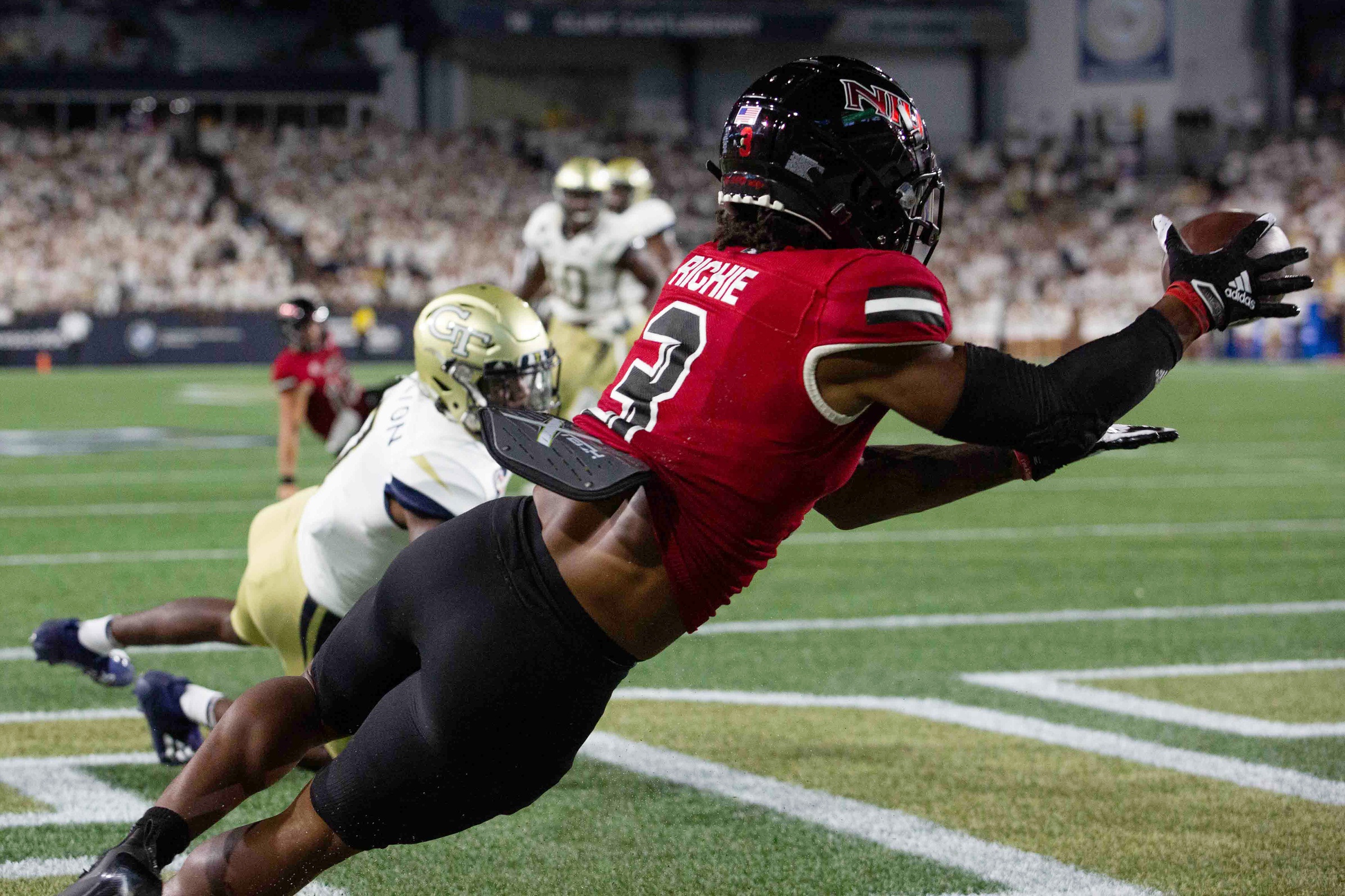 college football picks Tyrice Richie niu huskies predictions best bet odds