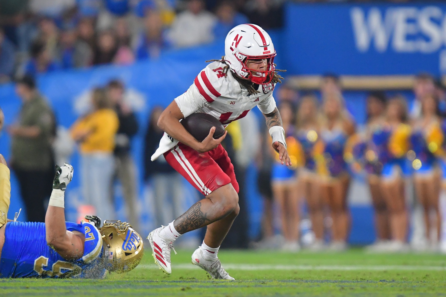 NCAA football predictions Week 13 opening line report and picks TJ Lateef Nebraska