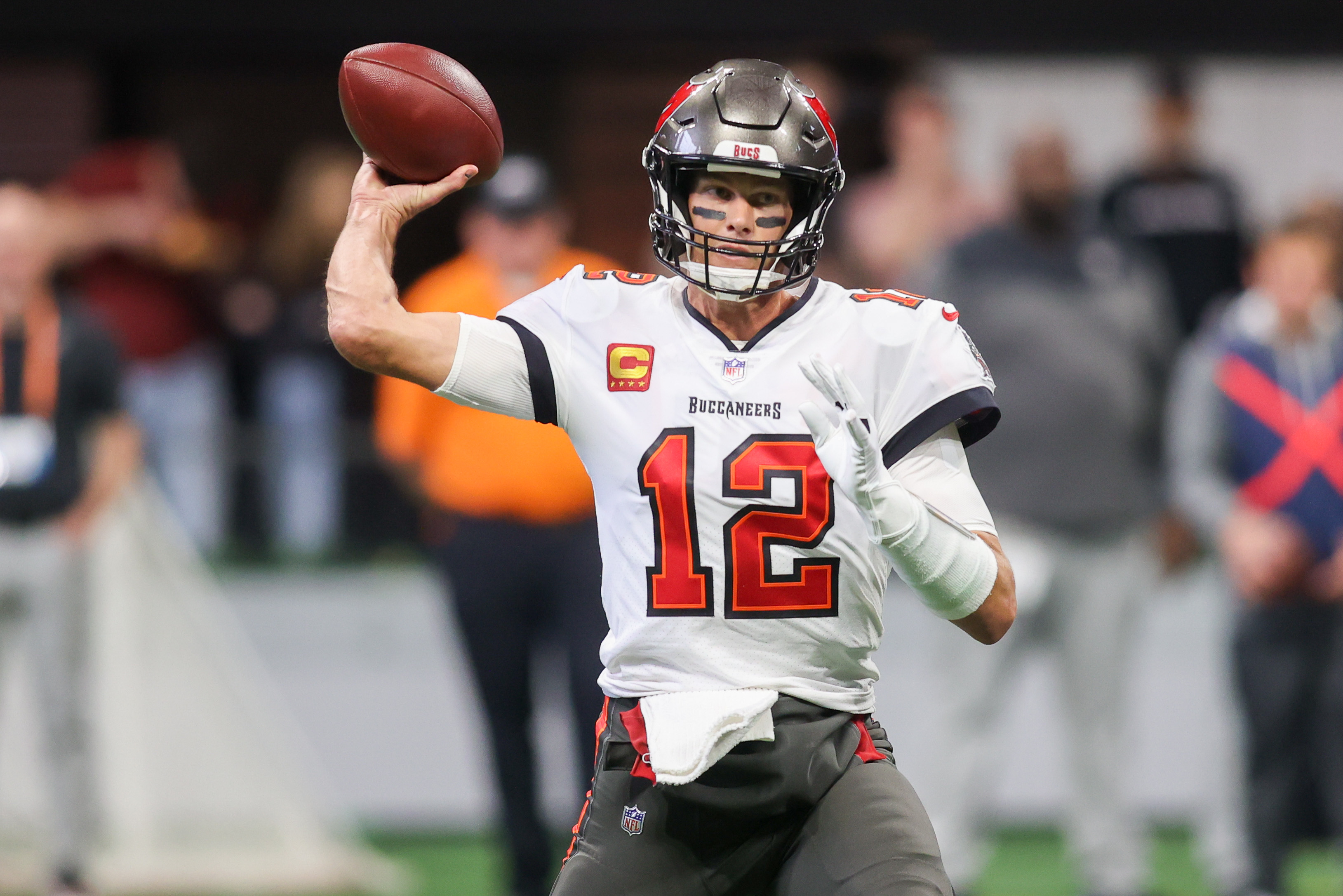 NFL Wild Card weekend opening lines predictions Tom Brady Tampa Bay Buccaneers