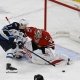 NHL totals betting hot and cold over under teams Spencer Knight Chicago Blackhawks