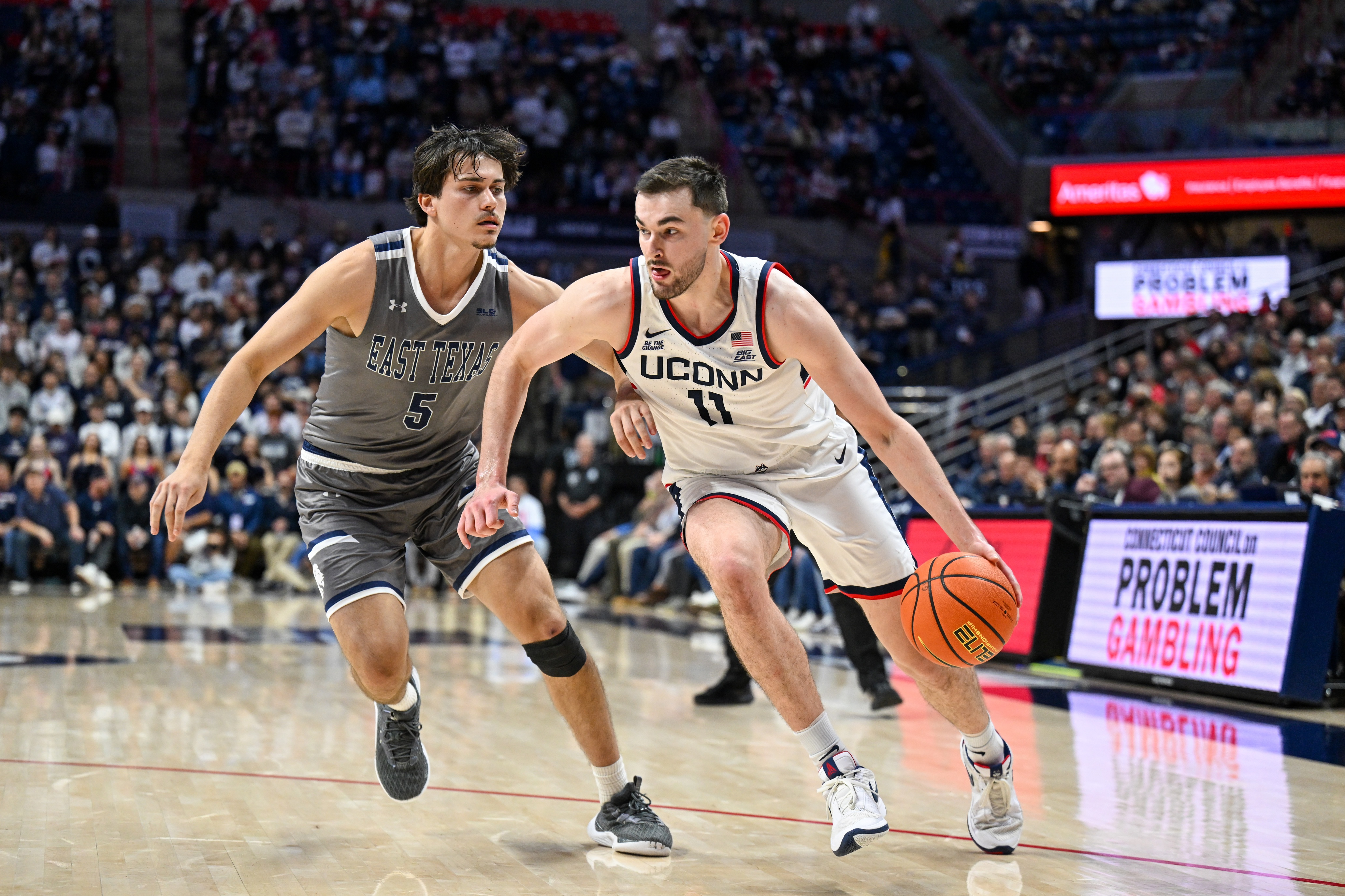 college basketball picks Alex Karaban Connecticut Huskies predictions best bet odds