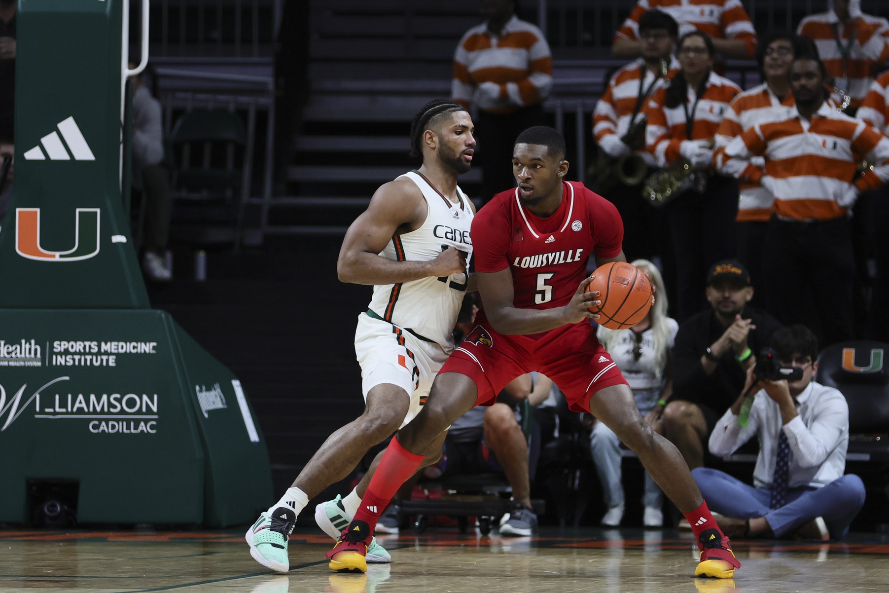 college basketball picks Brandon Huntley-Hatfield Louisville Cardinals predictions best bet odds