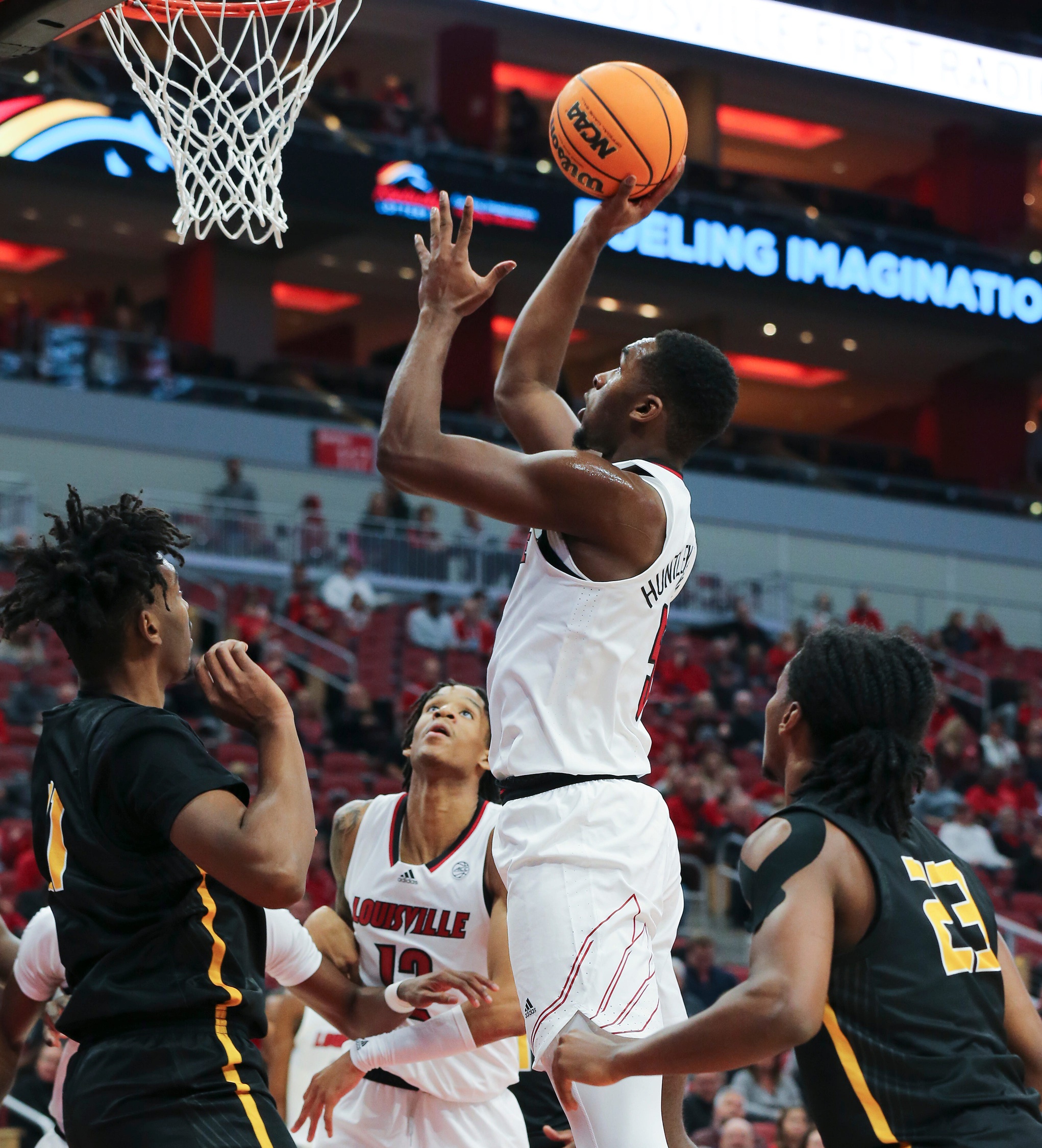 college basketball picks Brandon Huntley-Hatfield Louisville Cardinals predictions best bet odds