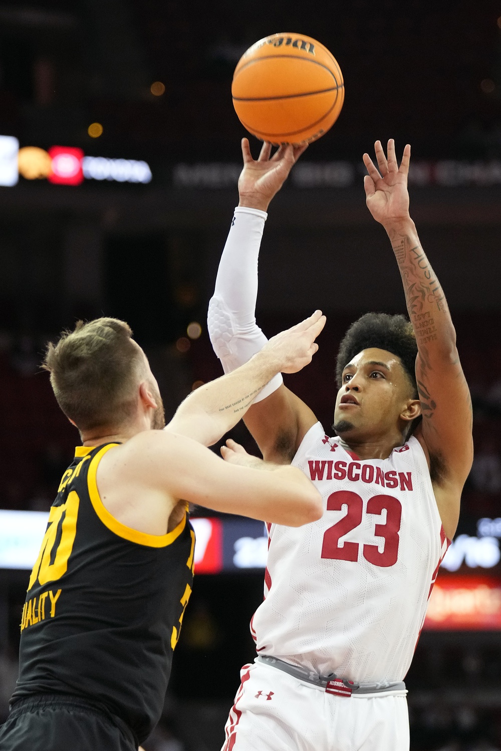 college basketball picks Chucky Hepburn Wisconsin Badgers predictions best bet odds