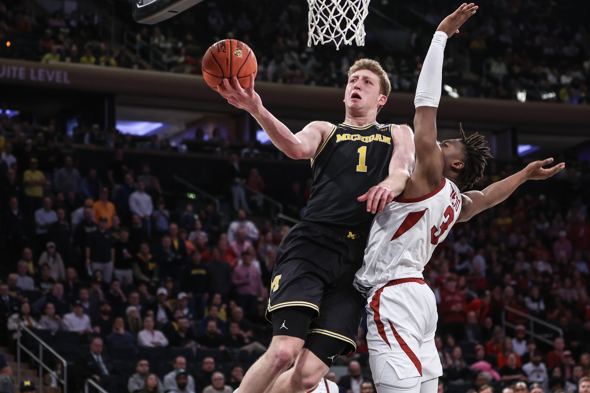 college basketball picks Danny Wolf Michigan Wolverines predictions best bet odds