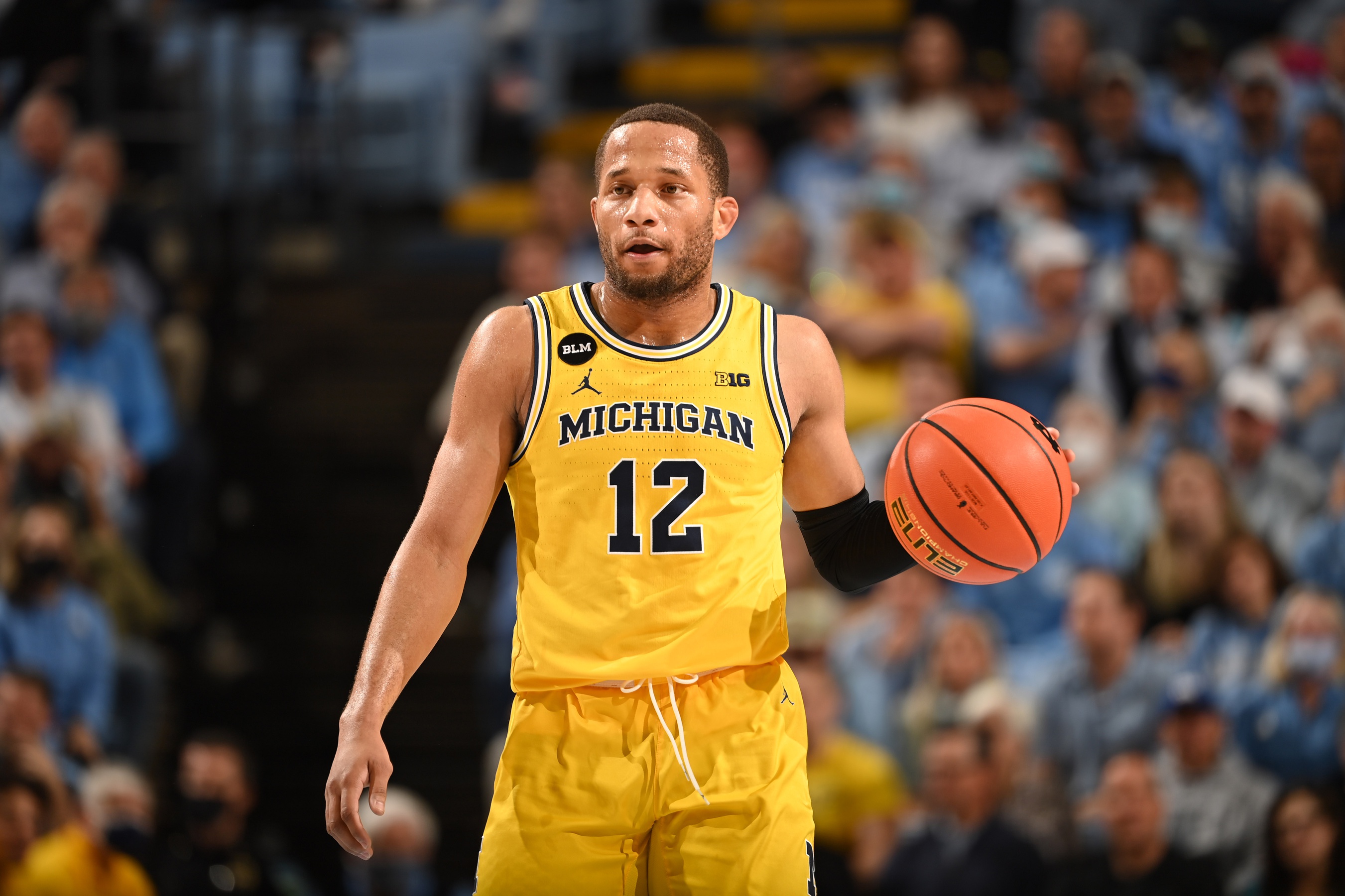 college basketball picks DeVante' Jones Michigan Wolverines predictions best bet odds