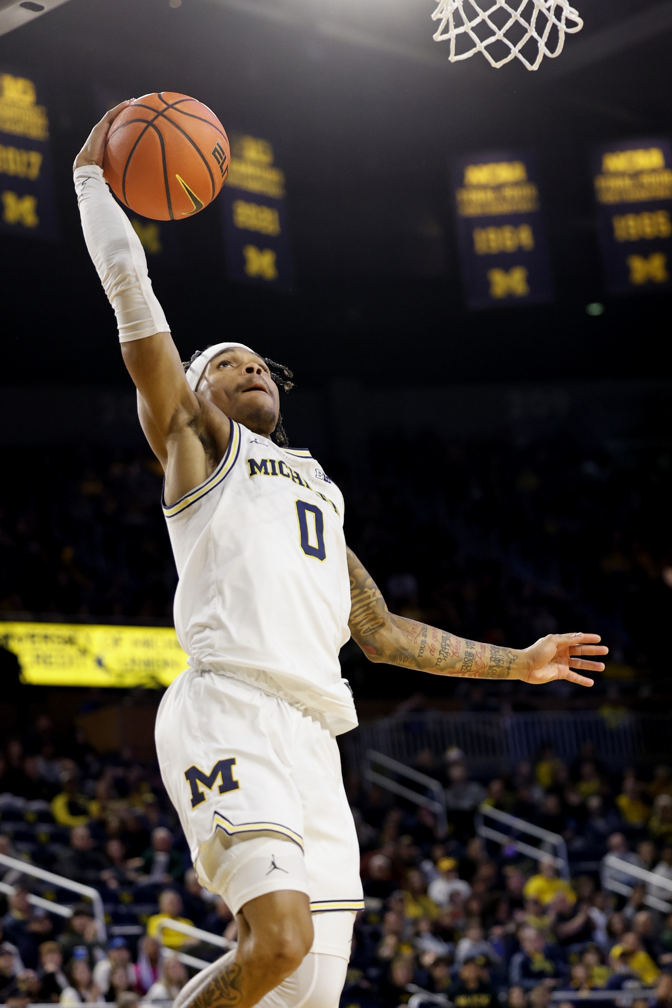 college basketball picks Dug McDaniel Michigan Wolverines predictions best bet odds