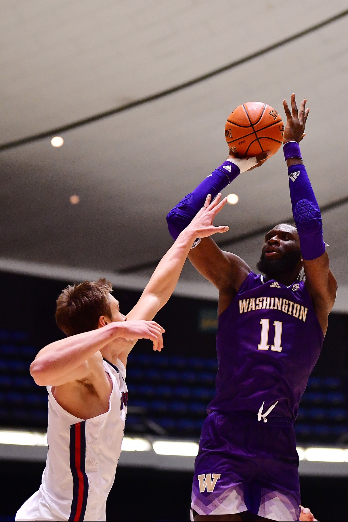 college basketball picks Franck Kepnang Washington Huskies predictions best bet odds