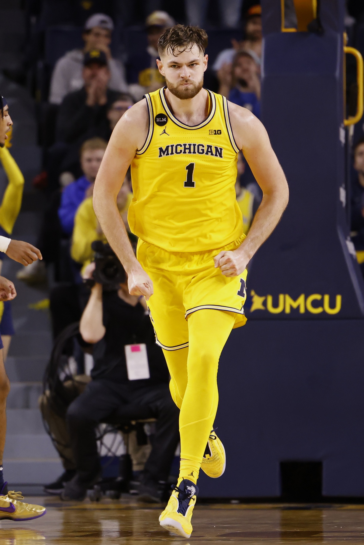 college basketball picks Hunter Dickinson Michigan Wolverines predictions best bet odds