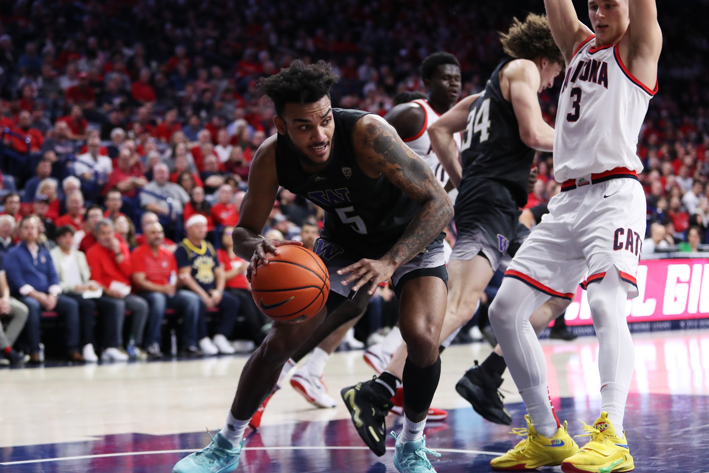 college basketball picks Jamal Bey Washington Huskies predictions best bet odds