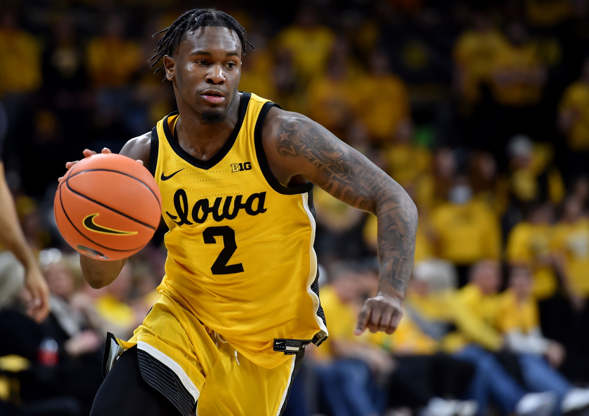 college basketball picks Joe Toussaint Iowa Hawkeyes predictions best bet odds