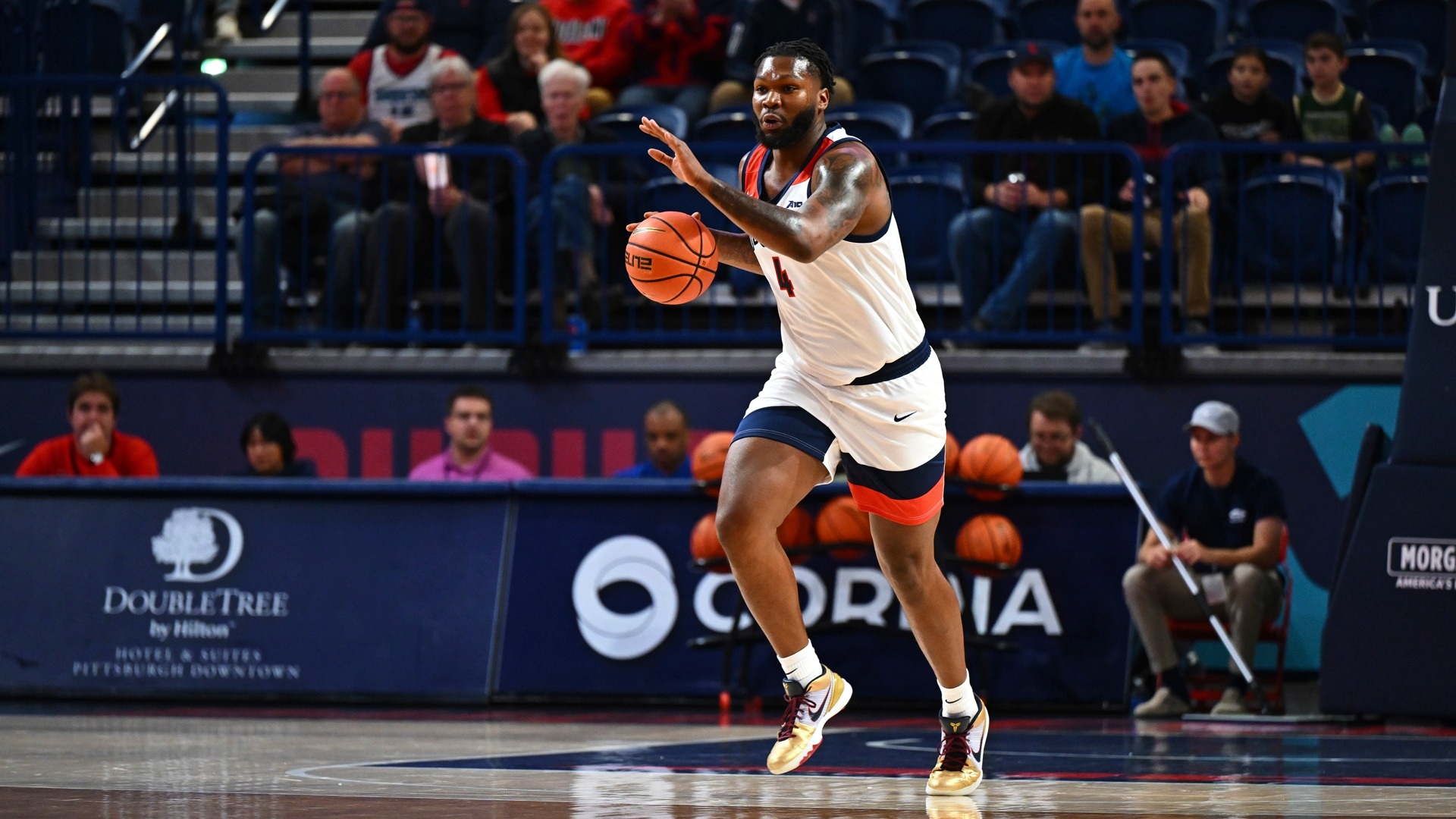 college basketball picks John Hugley IV Duquesne Dukes predictions best bet odds